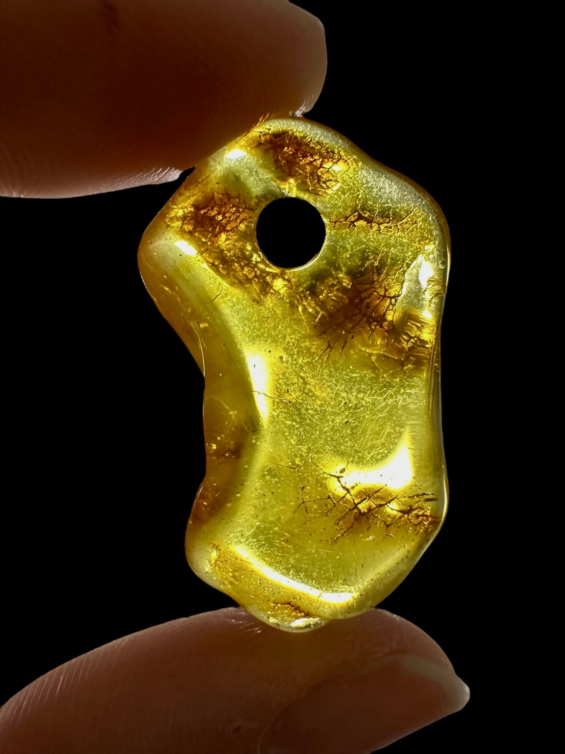 Amber with a drilled hole for hanging 2,7g – Lithuania - JND153