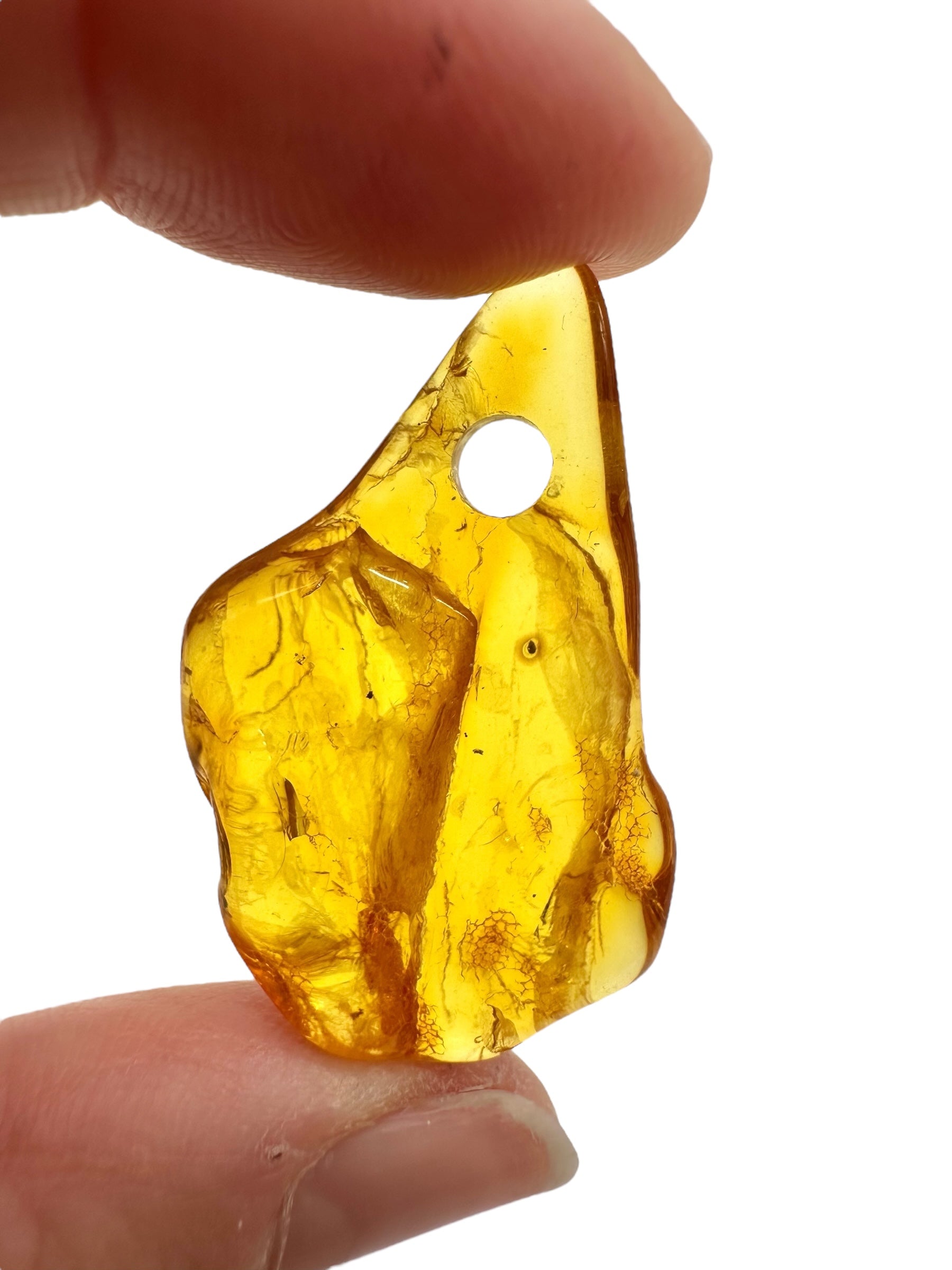 Amber with a drilled hole for hanging 2,7g – Lithuania - JND154