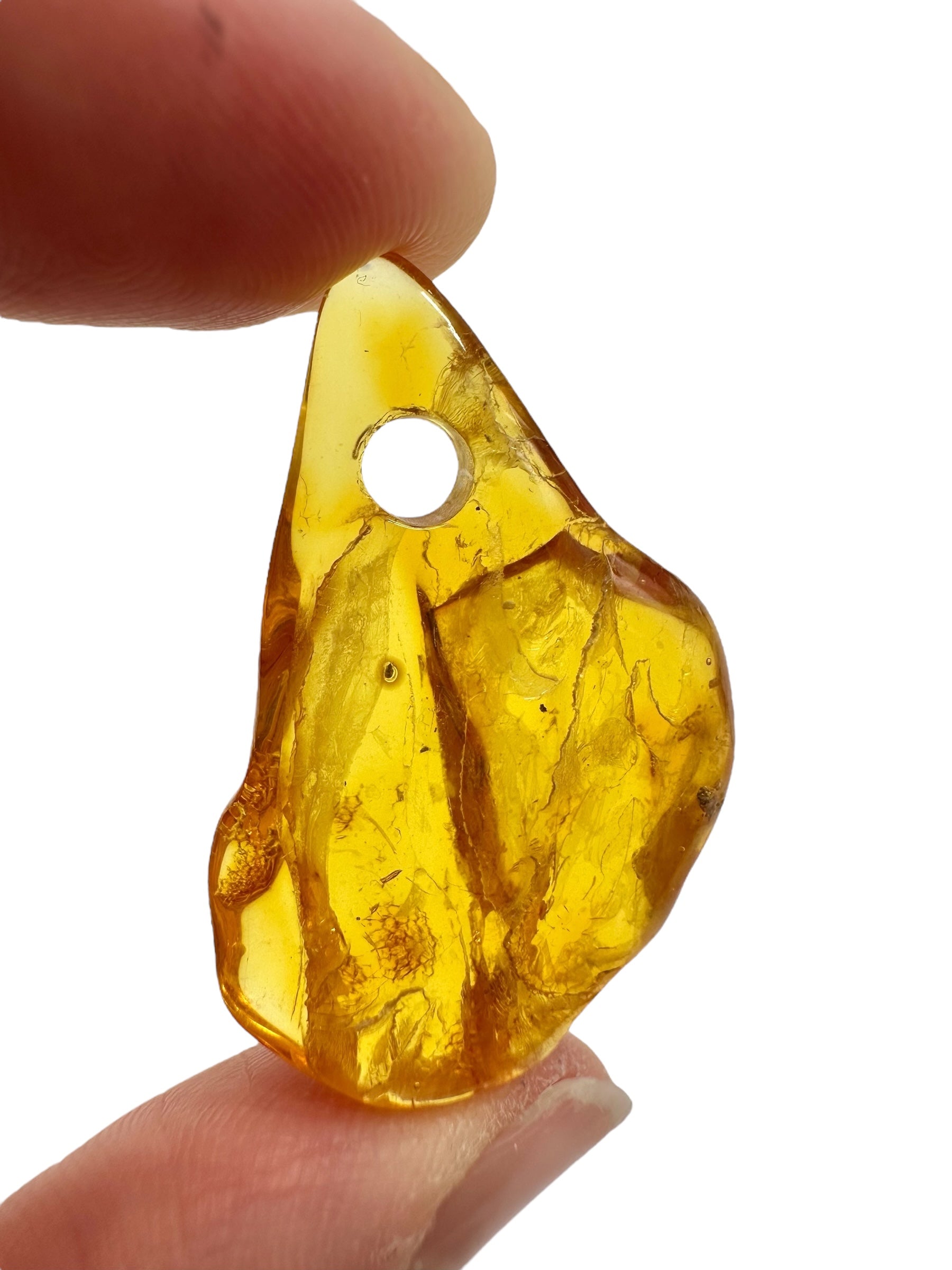 Amber with a drilled hole for hanging 2,7g – Lithuania - JND154