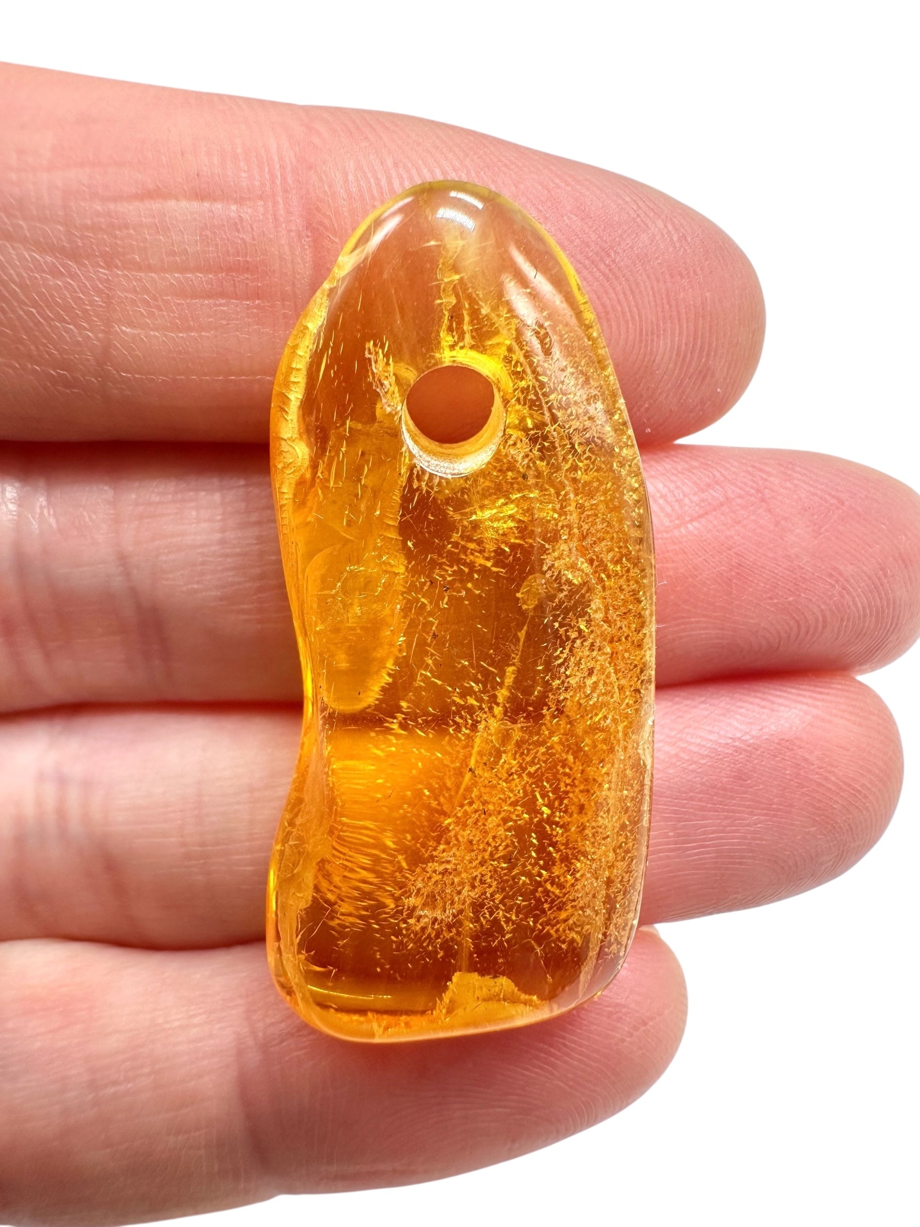 Amber with a drilled hole for hanging 2,8g – Lithuania