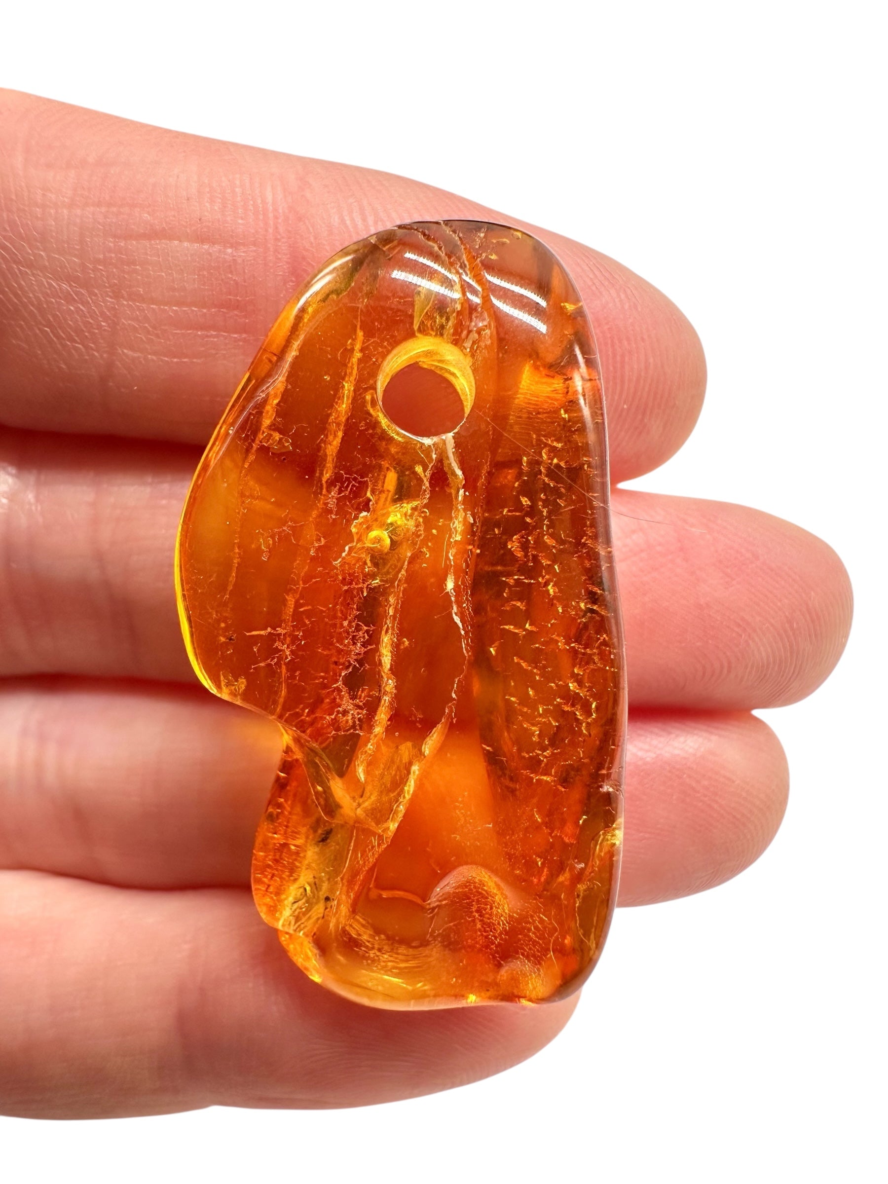 Amber with a drilled hole for hanging 3,5g – Lithuania