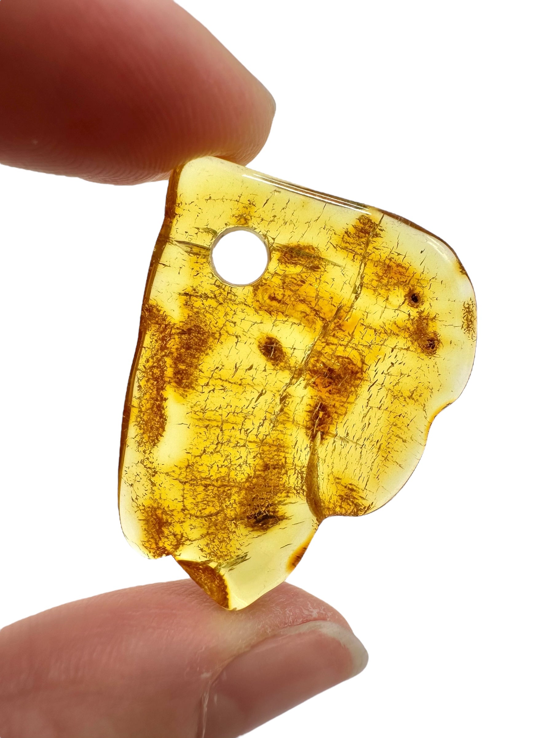 Amber with a drilled hole for hanging 2,4g – Lithuania - JND157