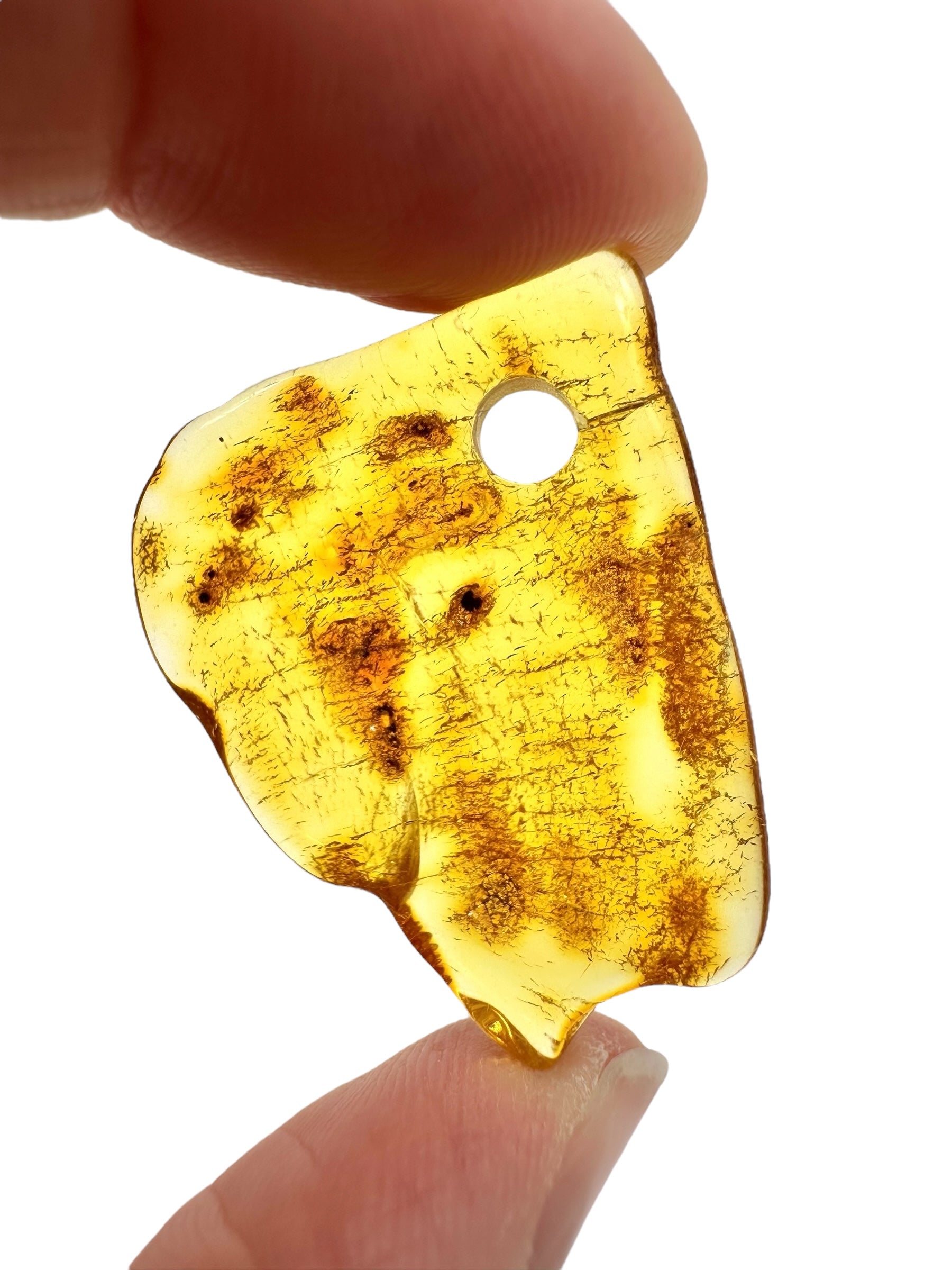 Amber with a drilled hole for hanging 2,4g – Lithuania - JND157