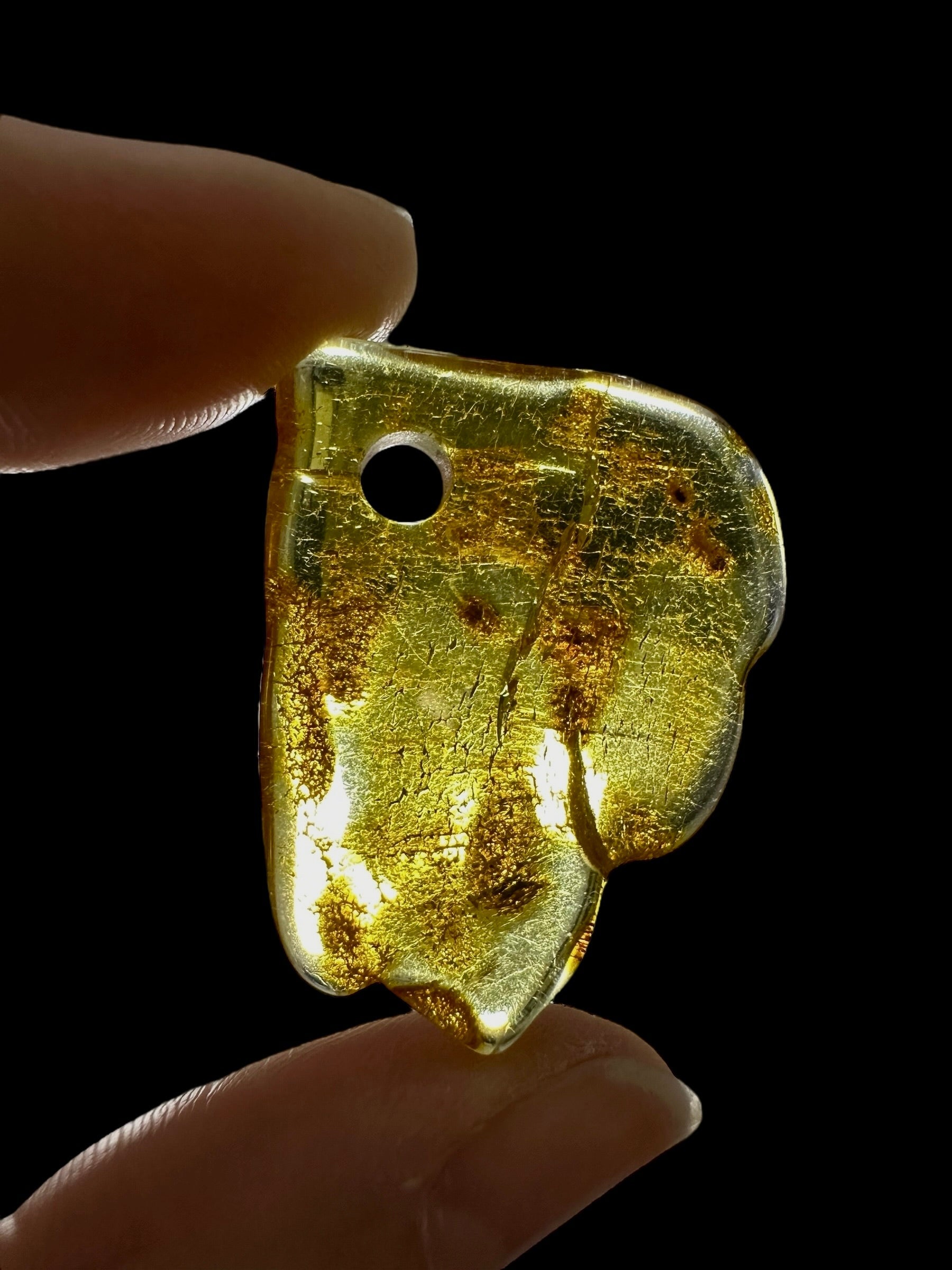 Amber with a drilled hole for hanging 2,4g – Lithuania - JND157
