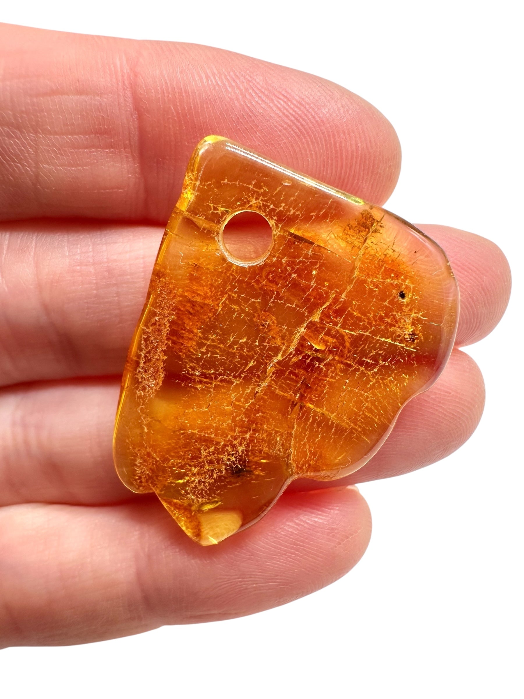 Amber with a drilled hole for hanging 2,4g – Lithuania