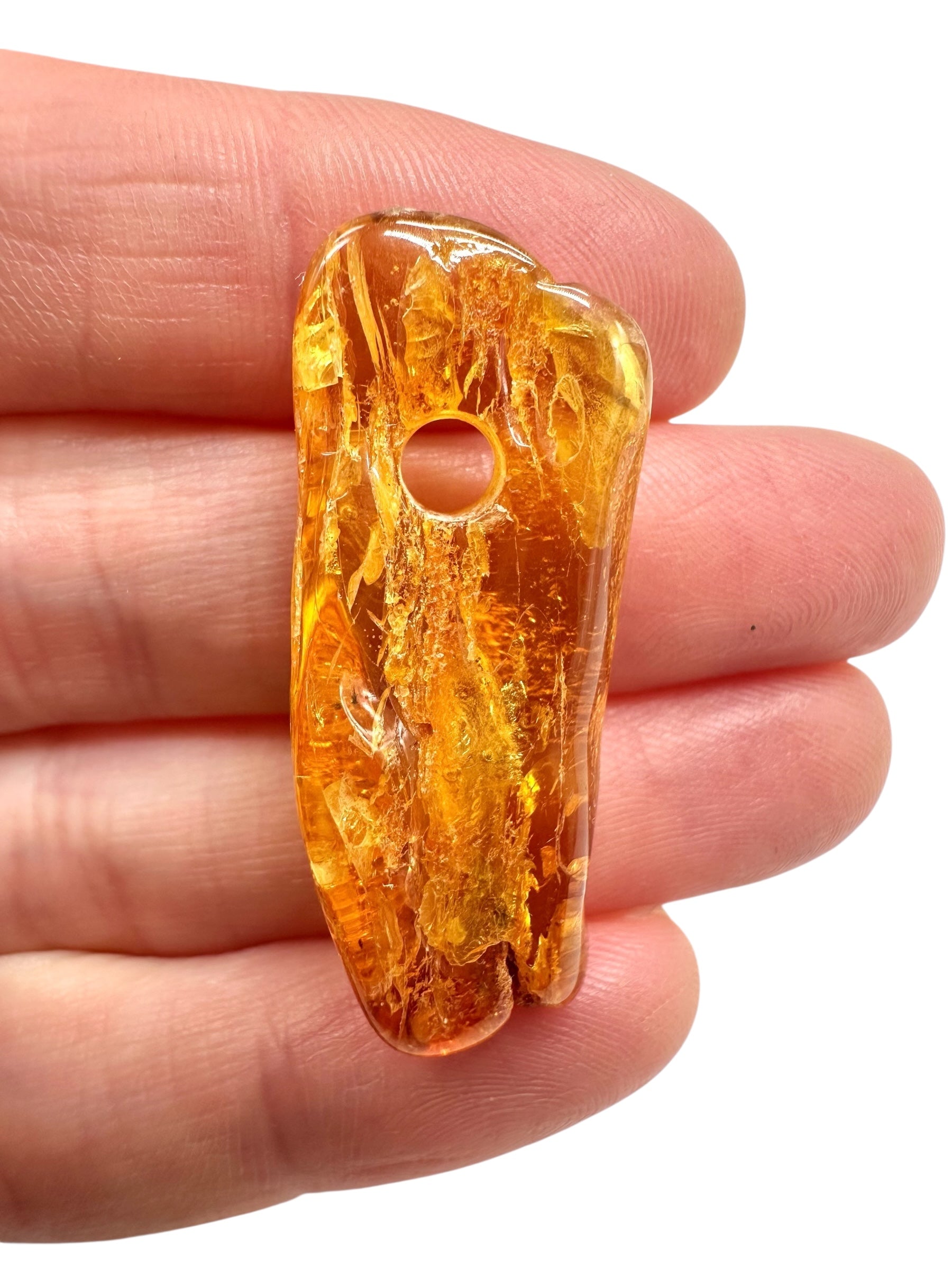 Amber with a drilled hole for hanging 2,4g – Lithuania - JND158