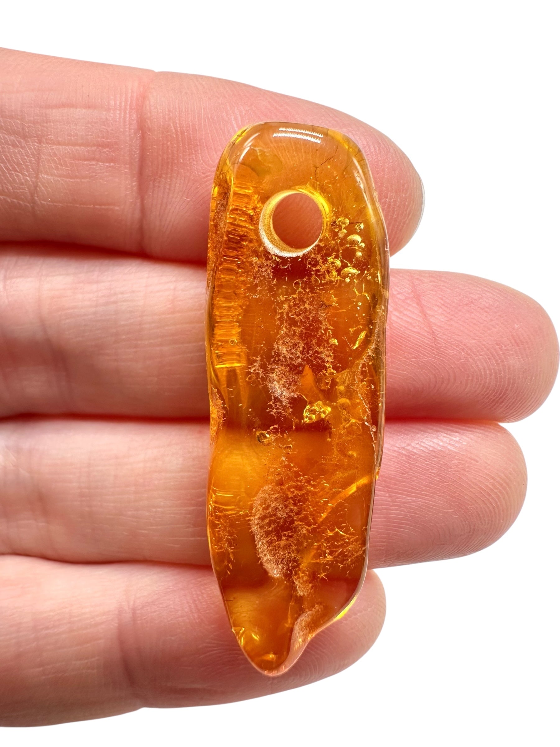 Amber with a drilled hole for hanging 2,1g – Lithuania - JND159