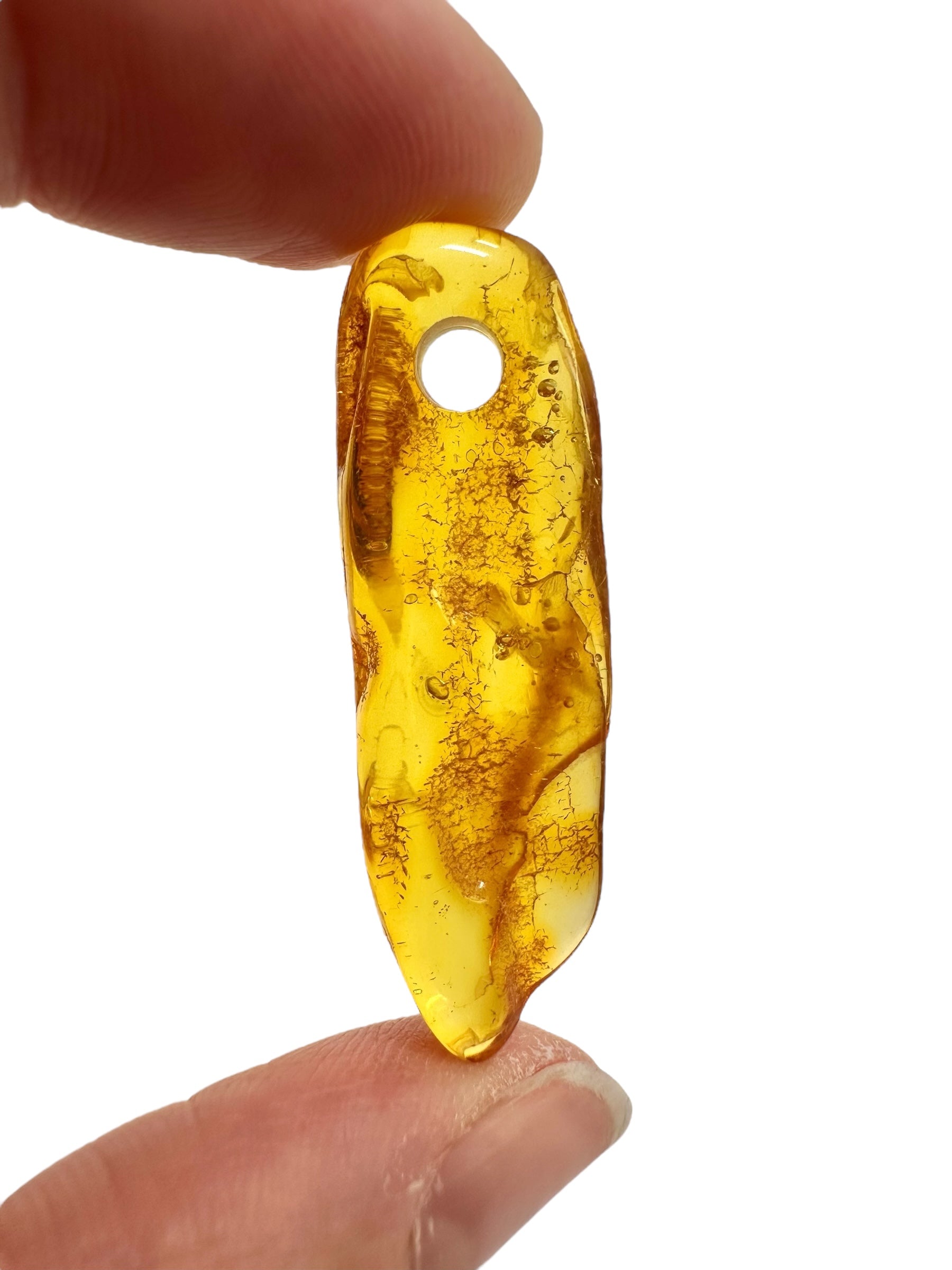 Amber with a drilled hole for hanging 2,1g – Lithuania - JND159
