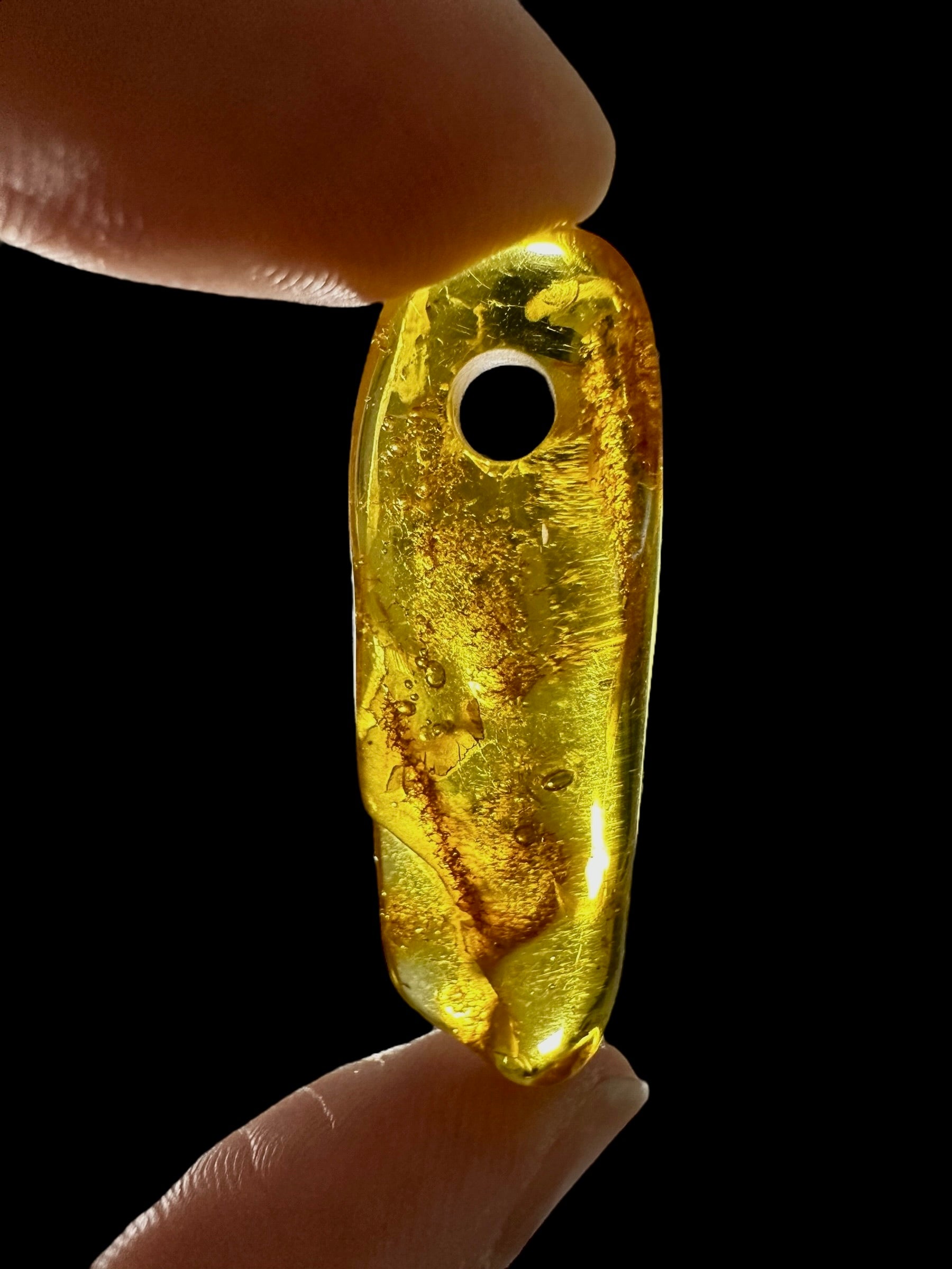 Amber with a drilled hole for hanging 2,1g – Lithuania - JND159