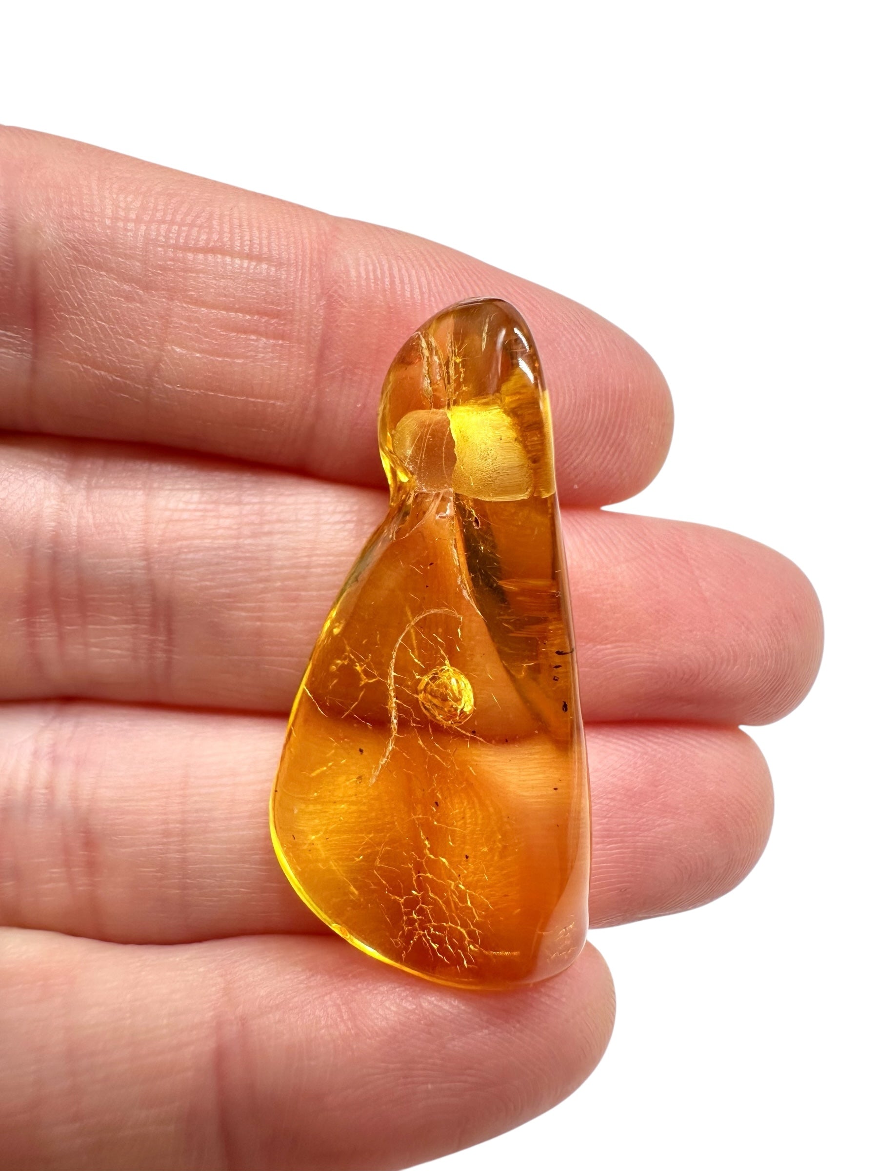 Amber with a drilled hole for hanging 2,3g – Lithuania