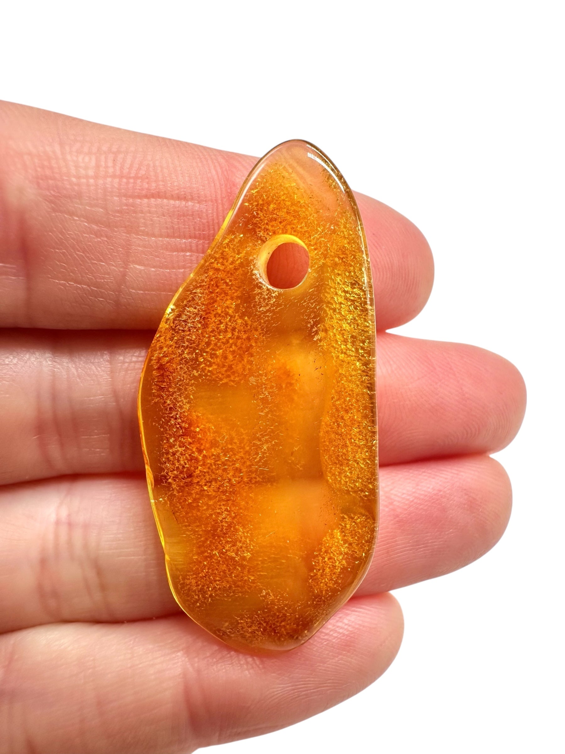 Amber with a drilled hole for hanging 2,6g – Lithuania - JND161