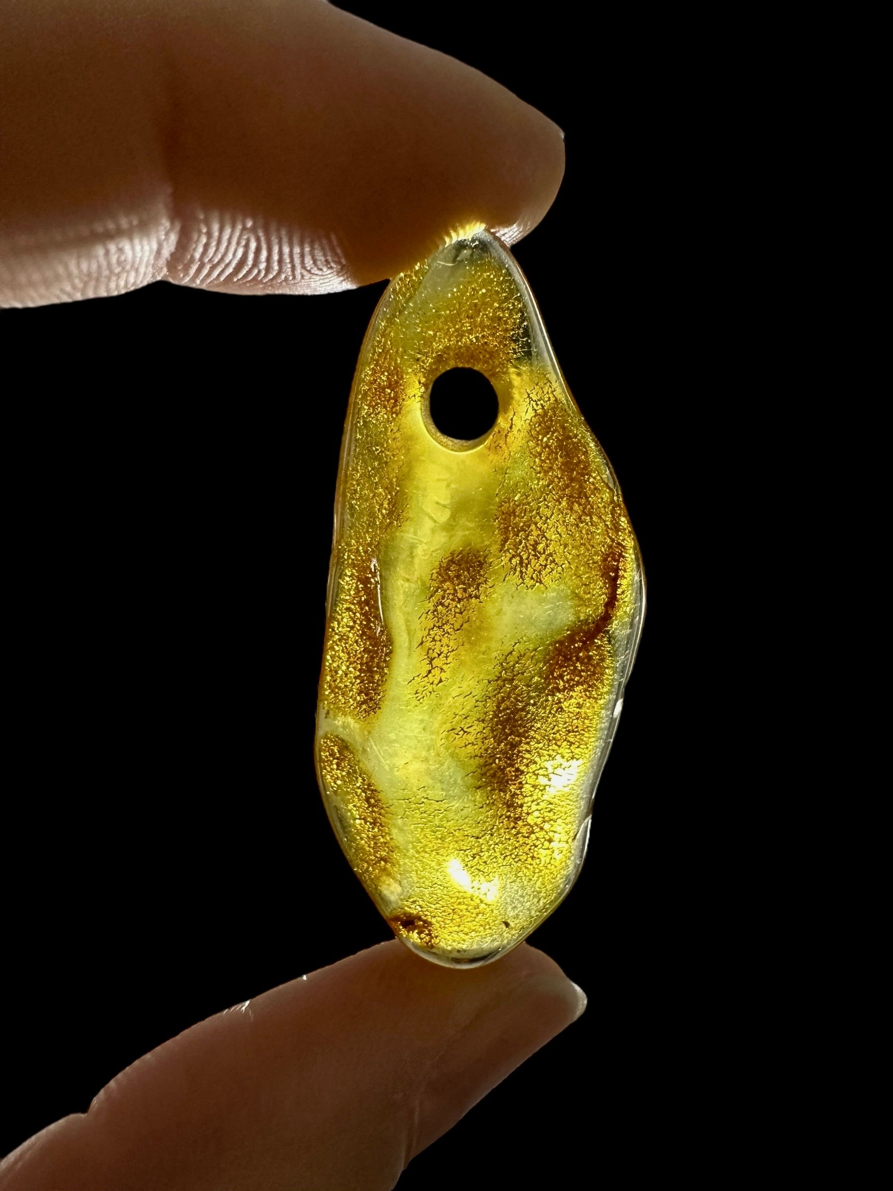 Amber with a drilled hole for hanging 2,6g – Lithuania - JND161