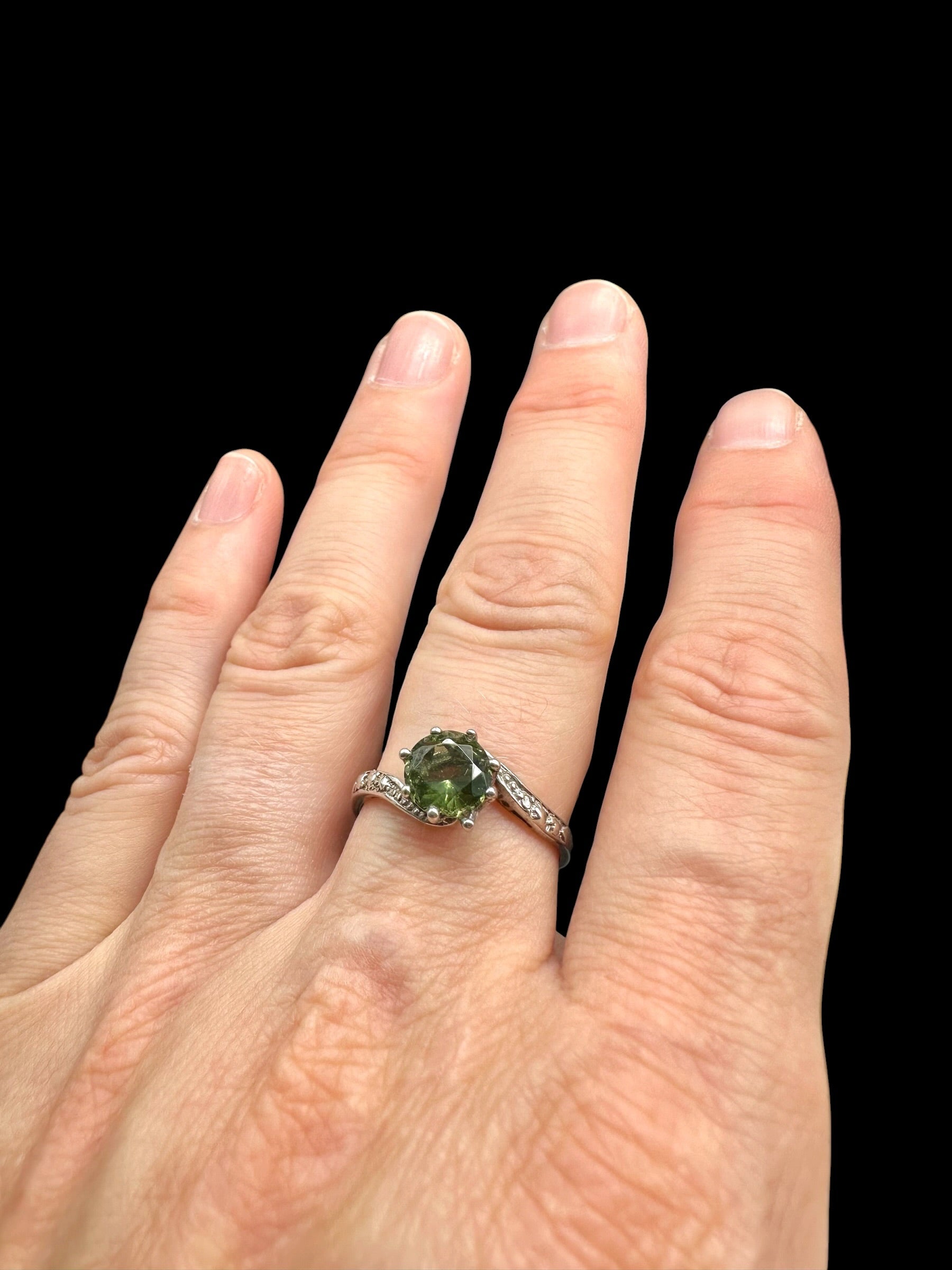 Silver ring with faceted moldavite size 58