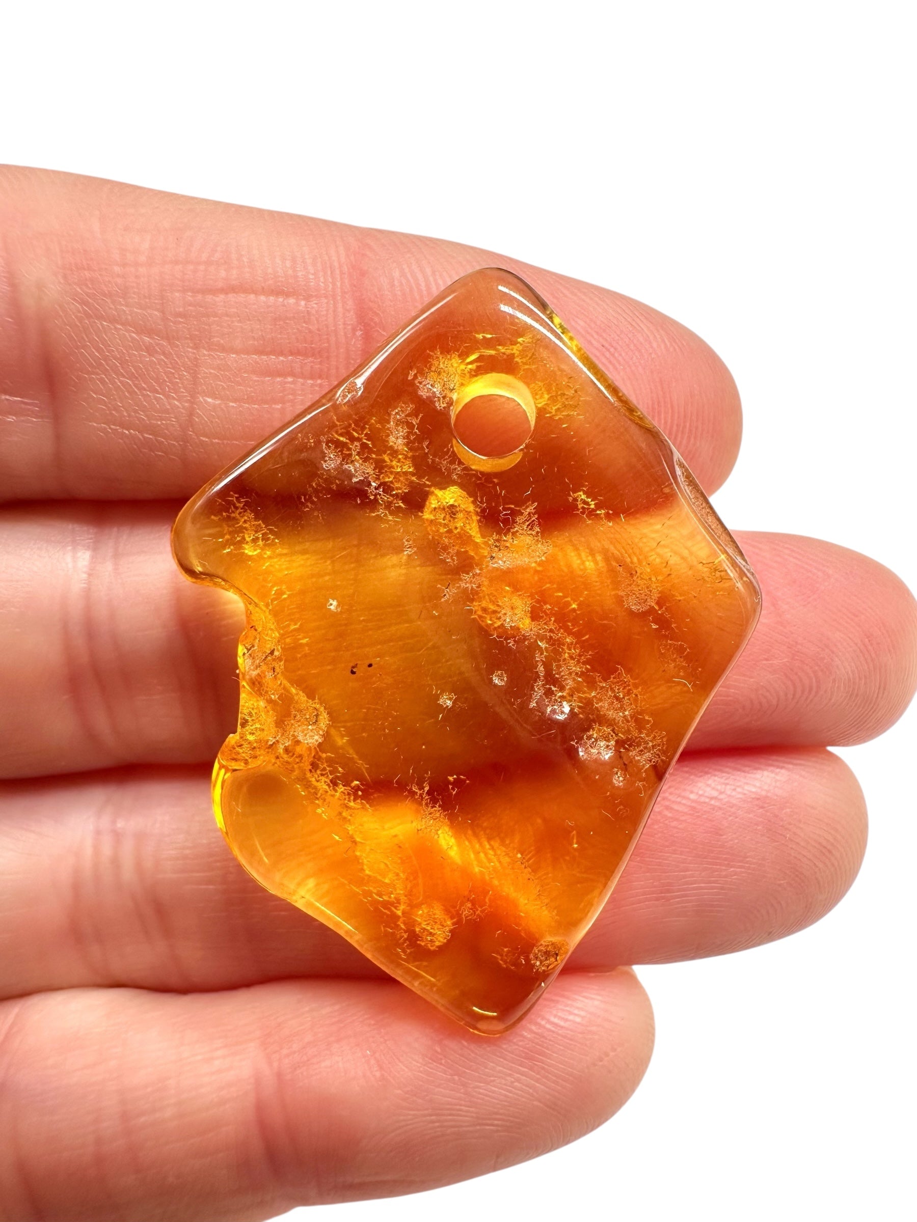 Amber with a drilled hole for hanging 3,3g – Lithuania