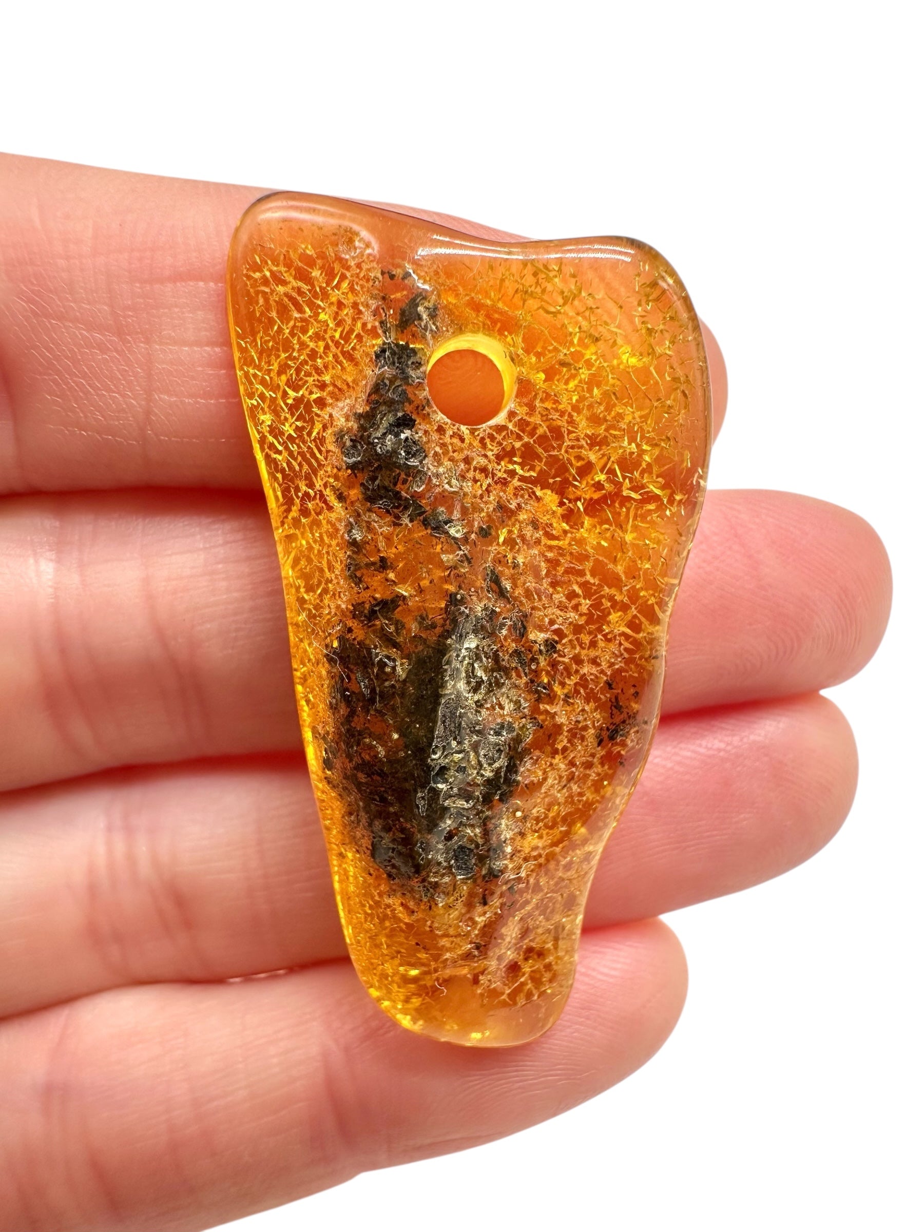 Amber with a drilled hole for hanging 4g – Lithuania
