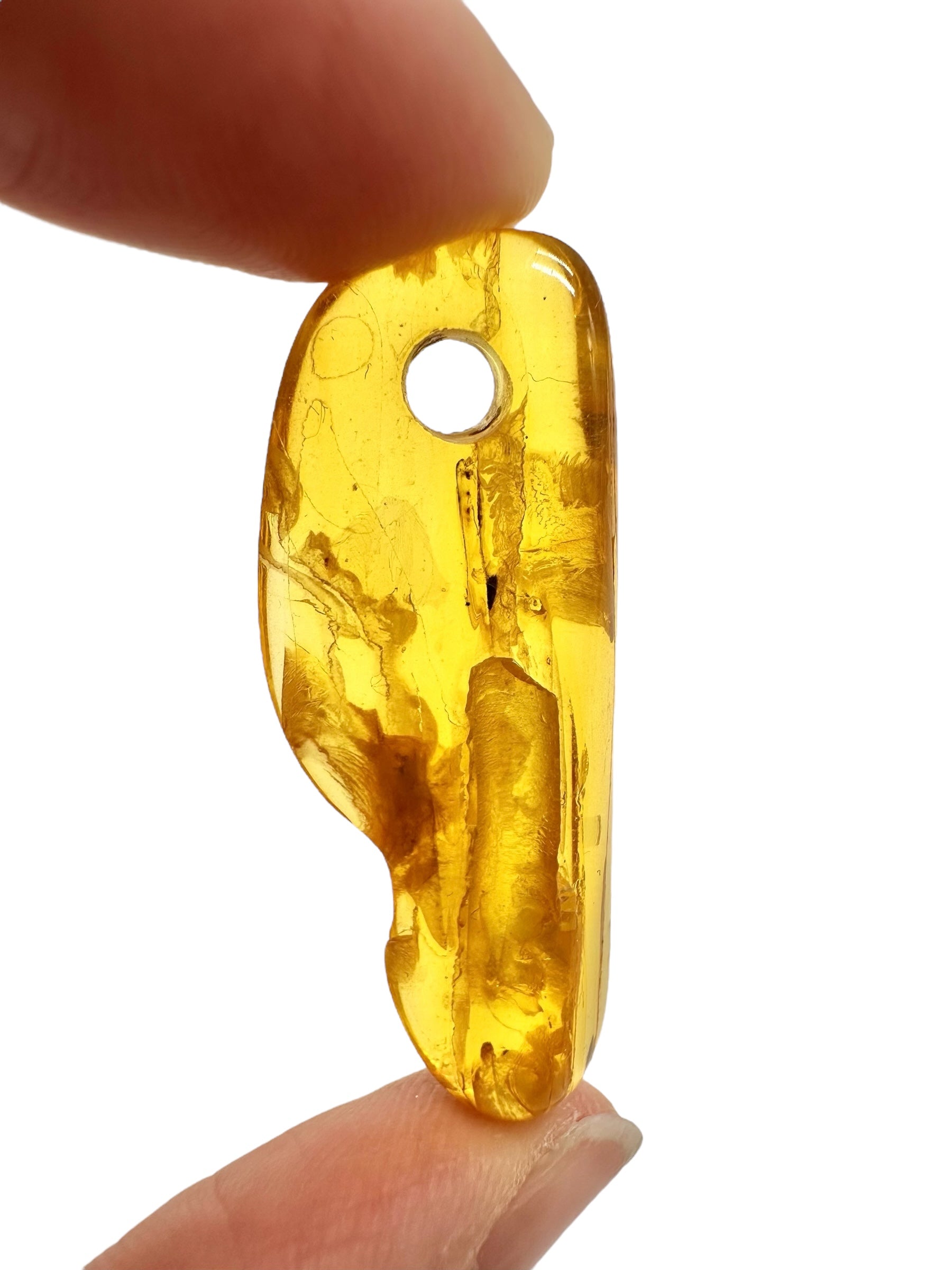 Amber with a drilled hole for hanging 2,4g – Lithuania - JND165