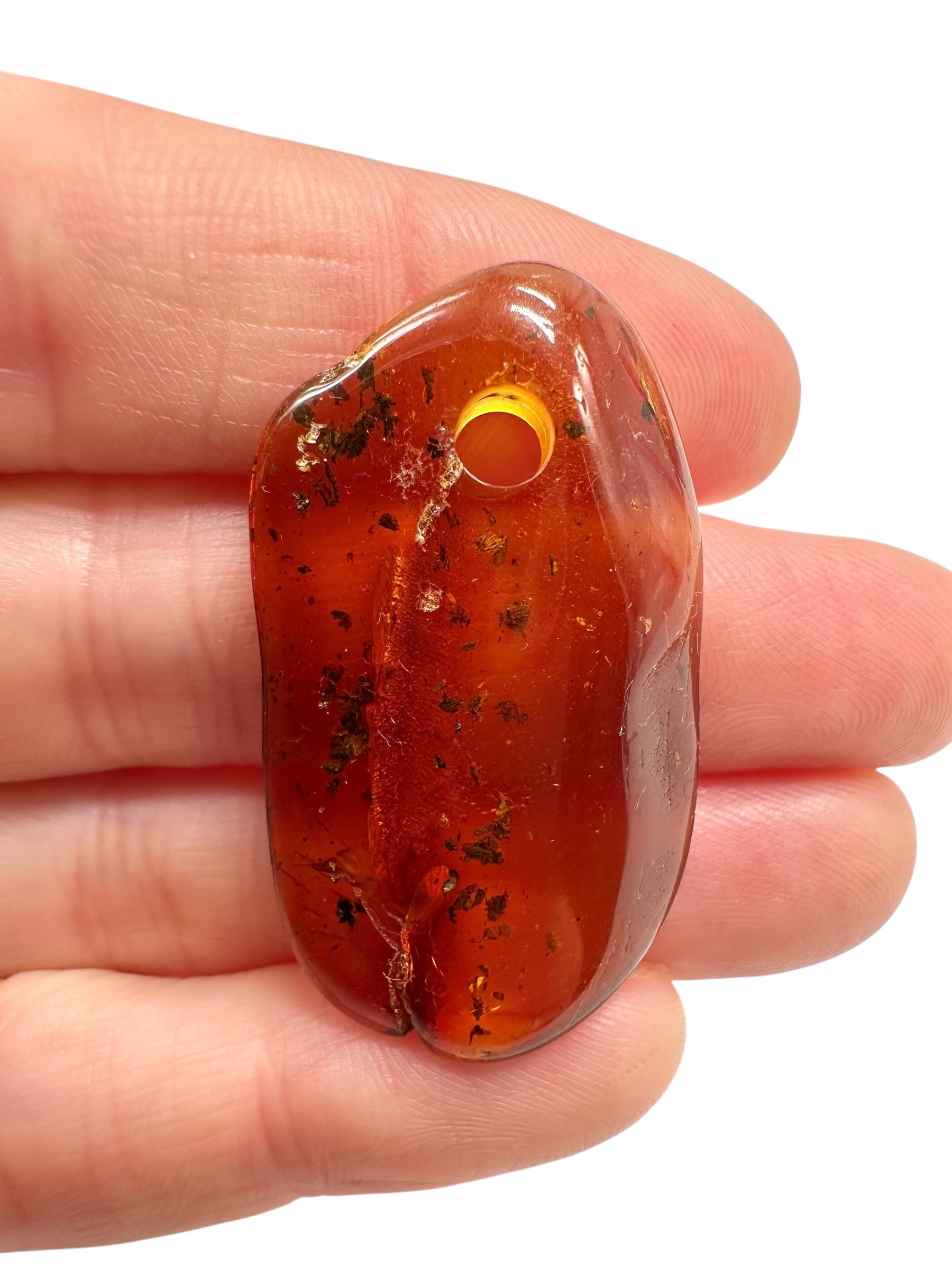 Amber with a drilled hole for hanging 2,9g – Lithuania
