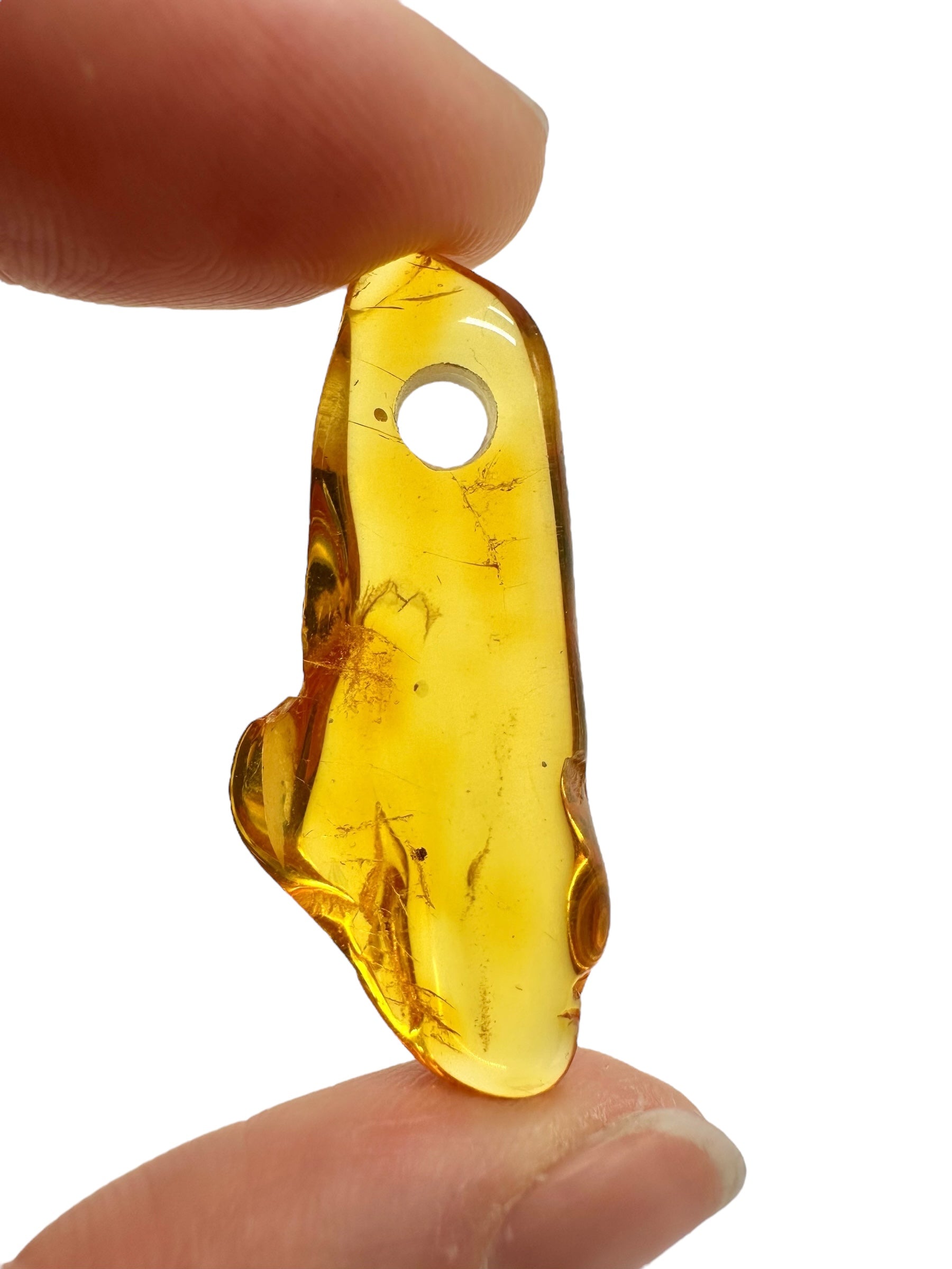Amber with a drilled hole for hanging 1,9g – Lithuania - JND169