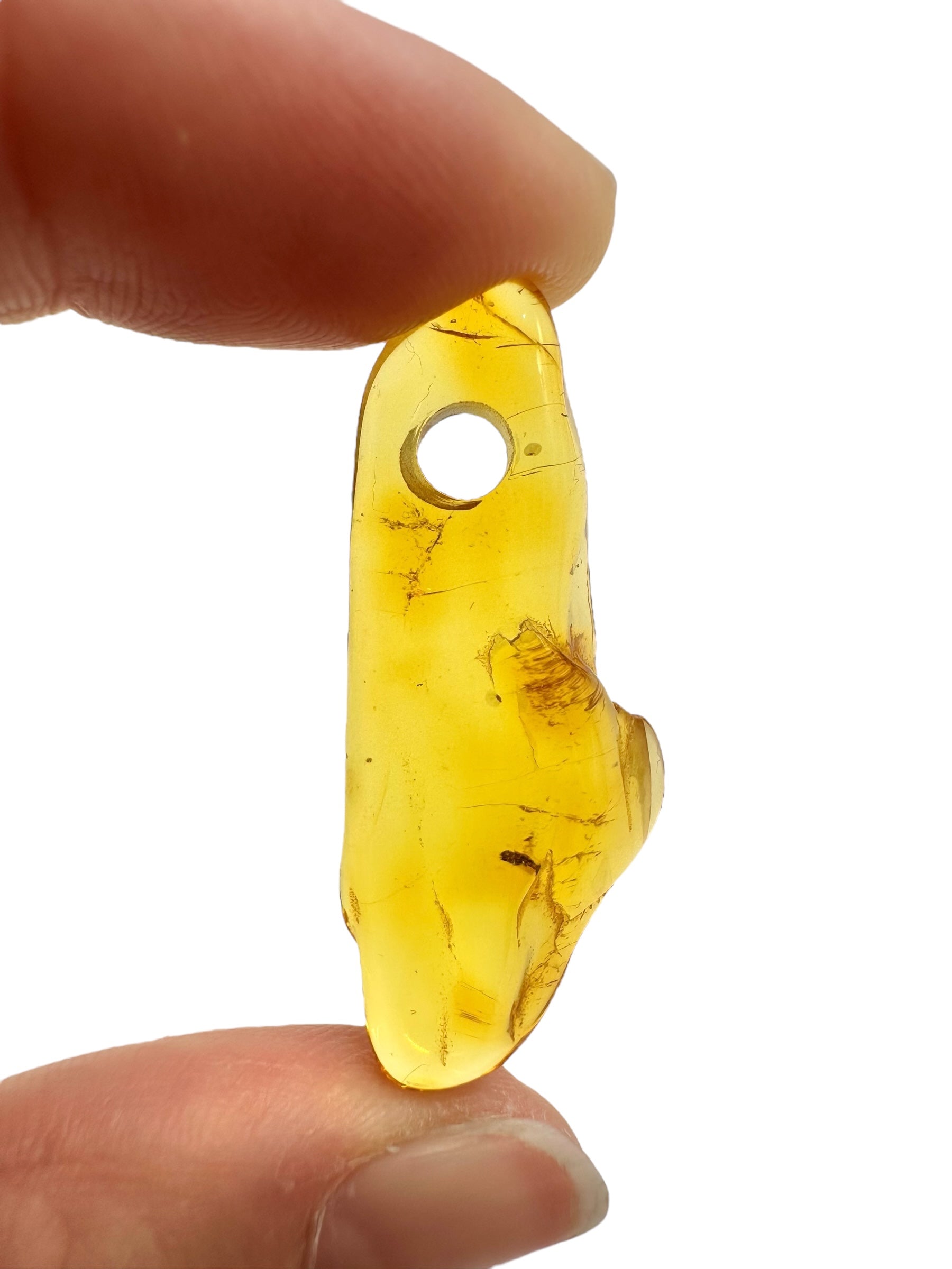 Amber with a drilled hole for hanging 1,9g – Lithuania - JND169