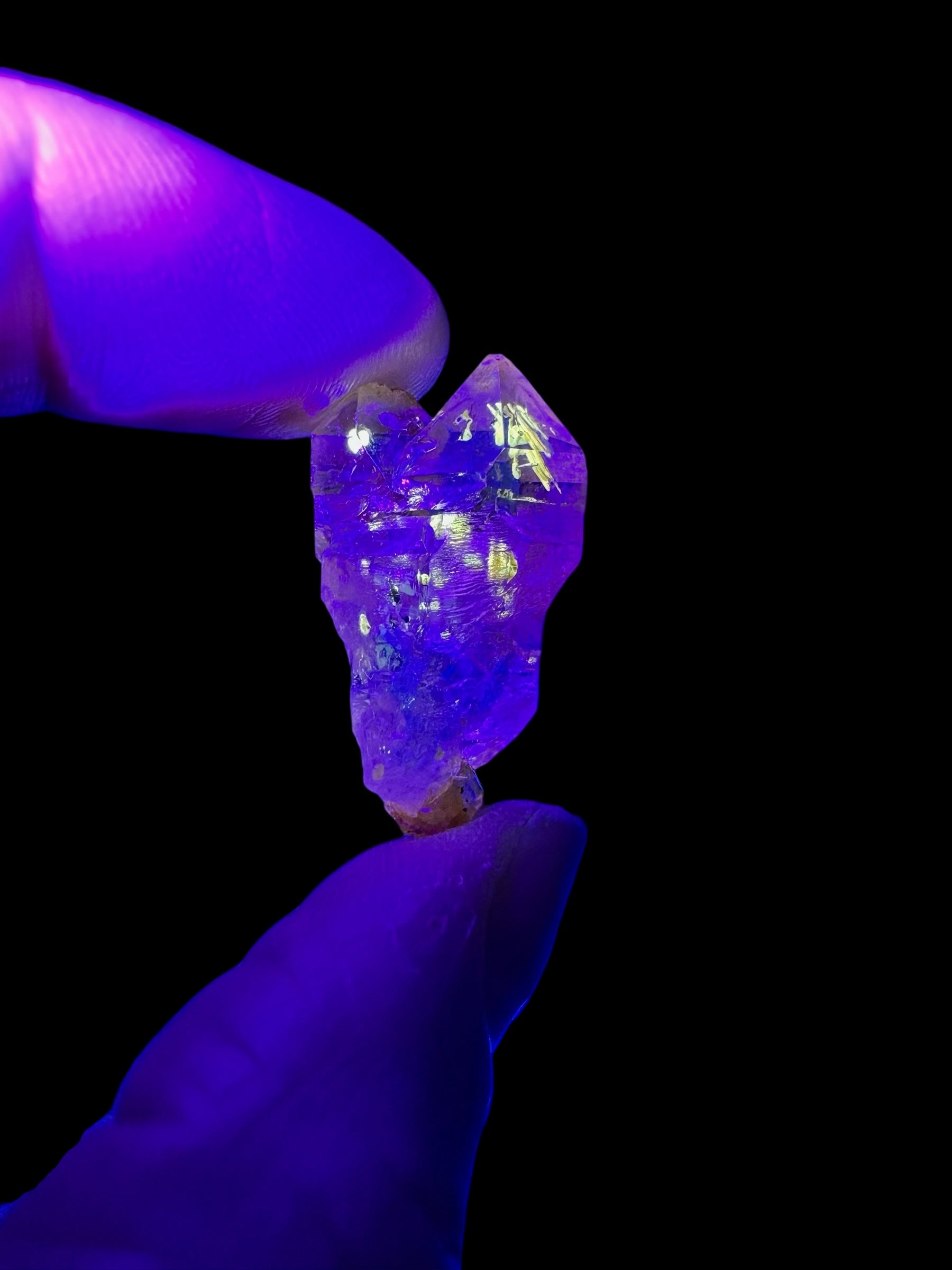 Crystal with petroleum inclusions – Madagascar