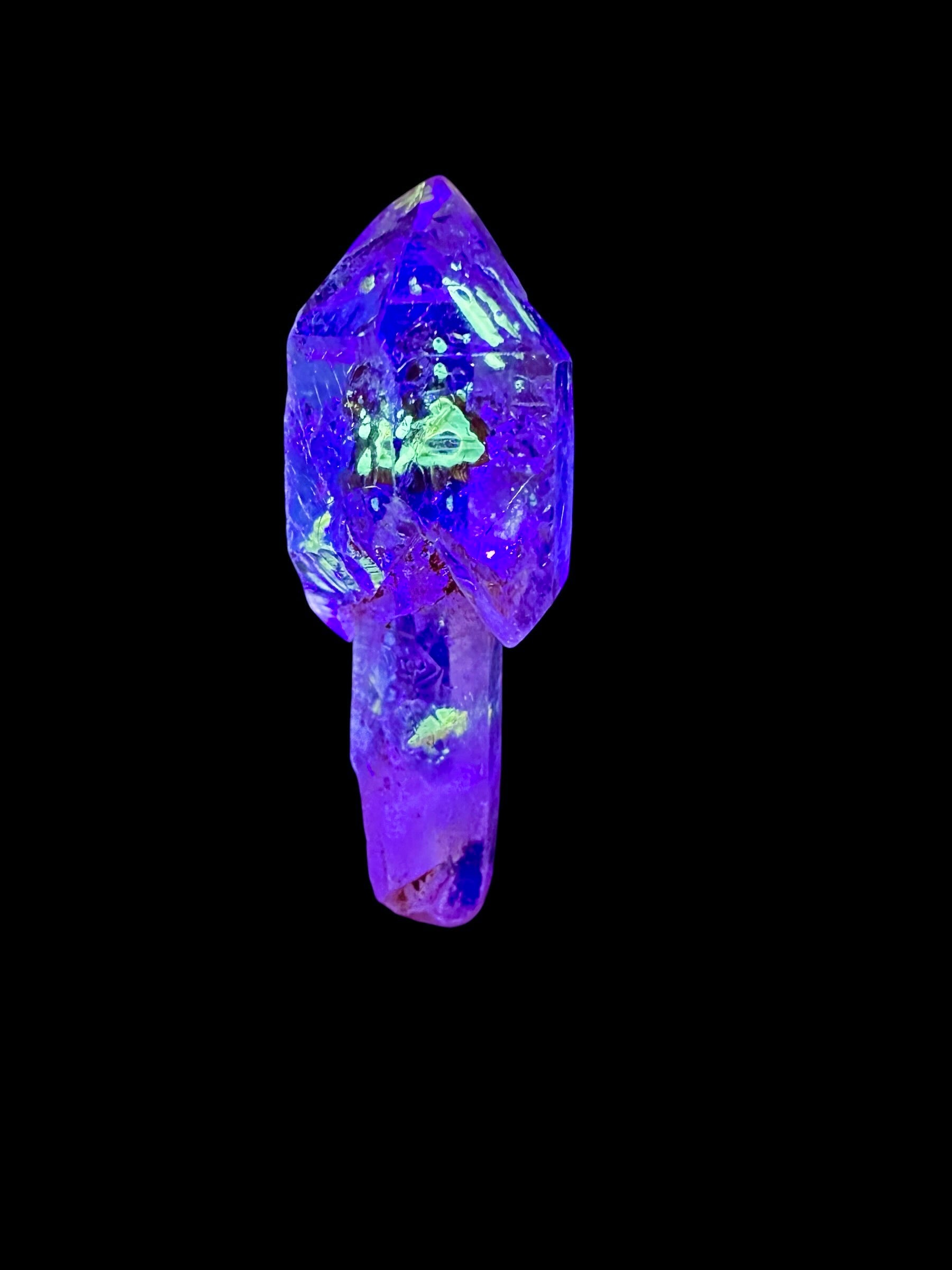 Crystal with petroleum inclusions – Madagascar
