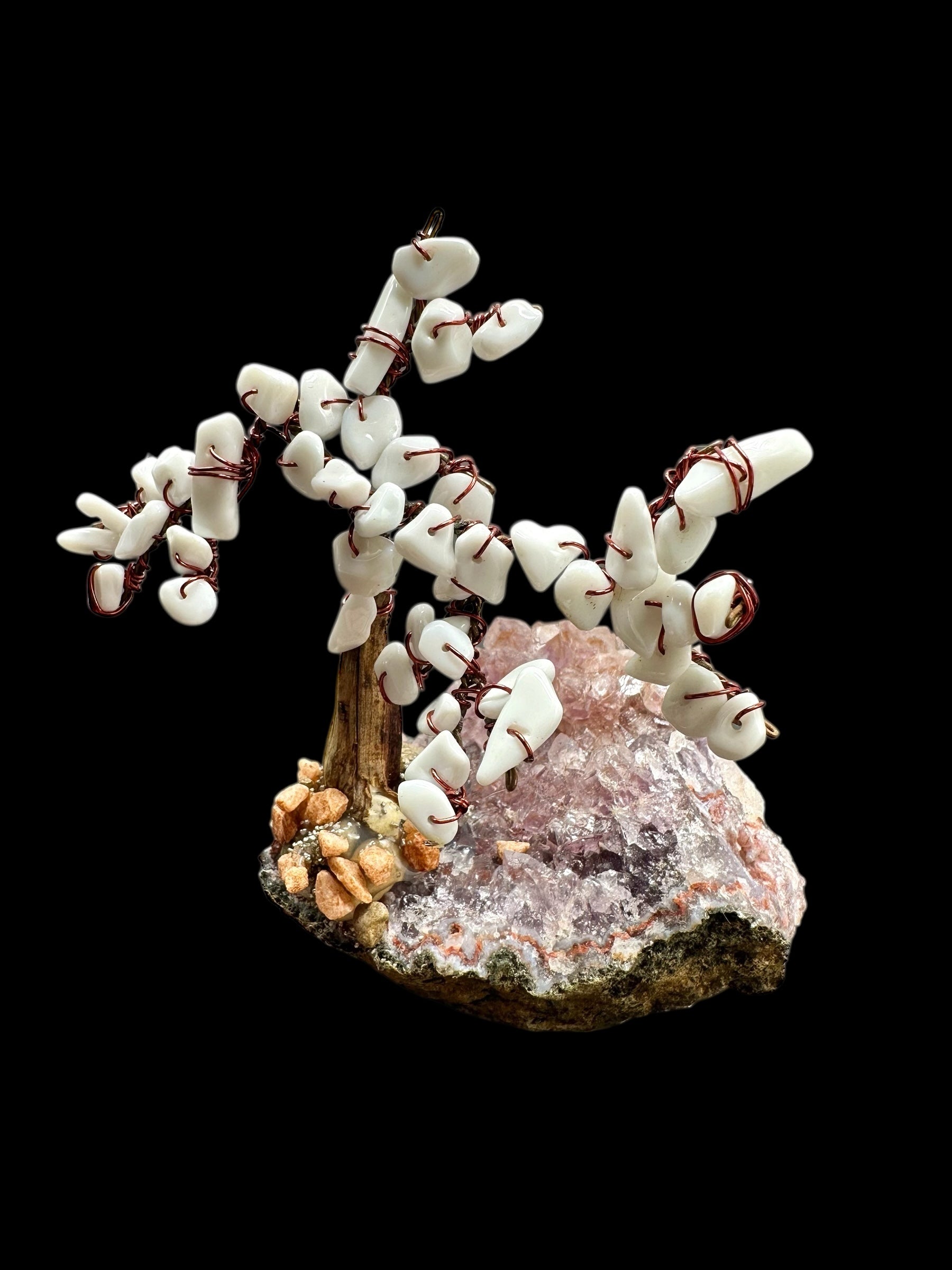 Howlite tree in crystal geod