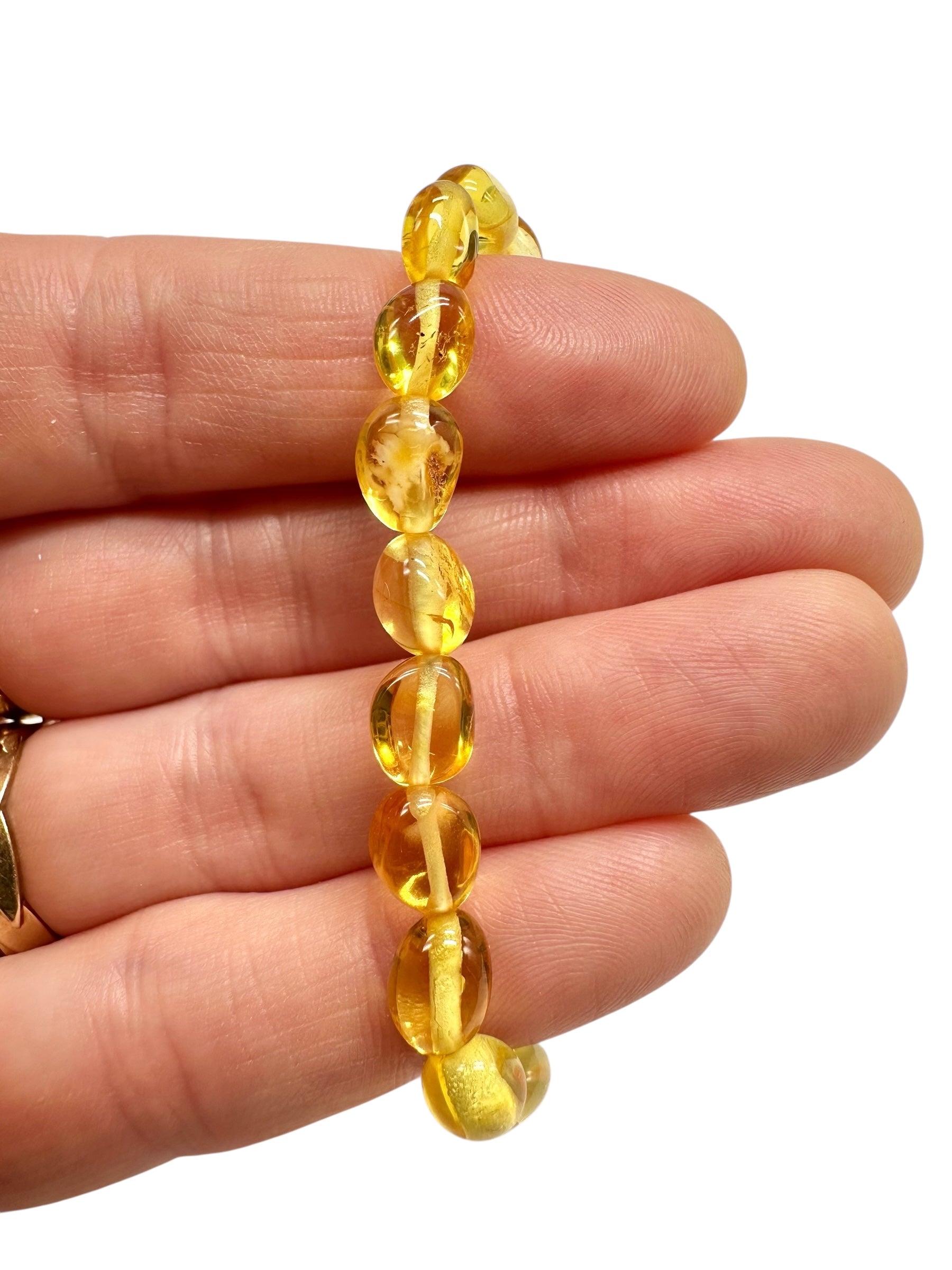 Children's bracelet made of polished genuine amber spheres / light – random piece - N/J016