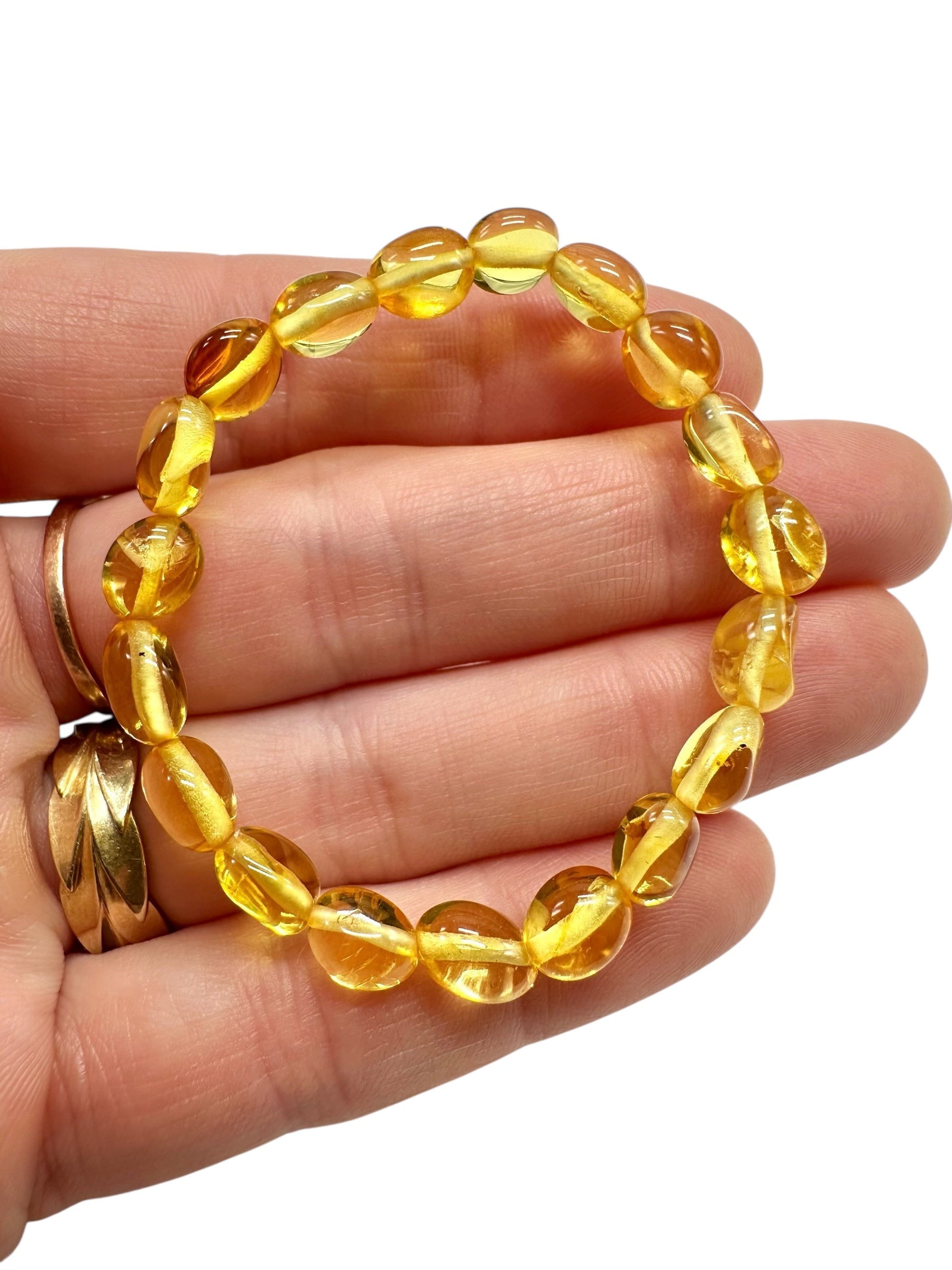 Children's bracelet made of polished genuine amber spheres / light – random piece