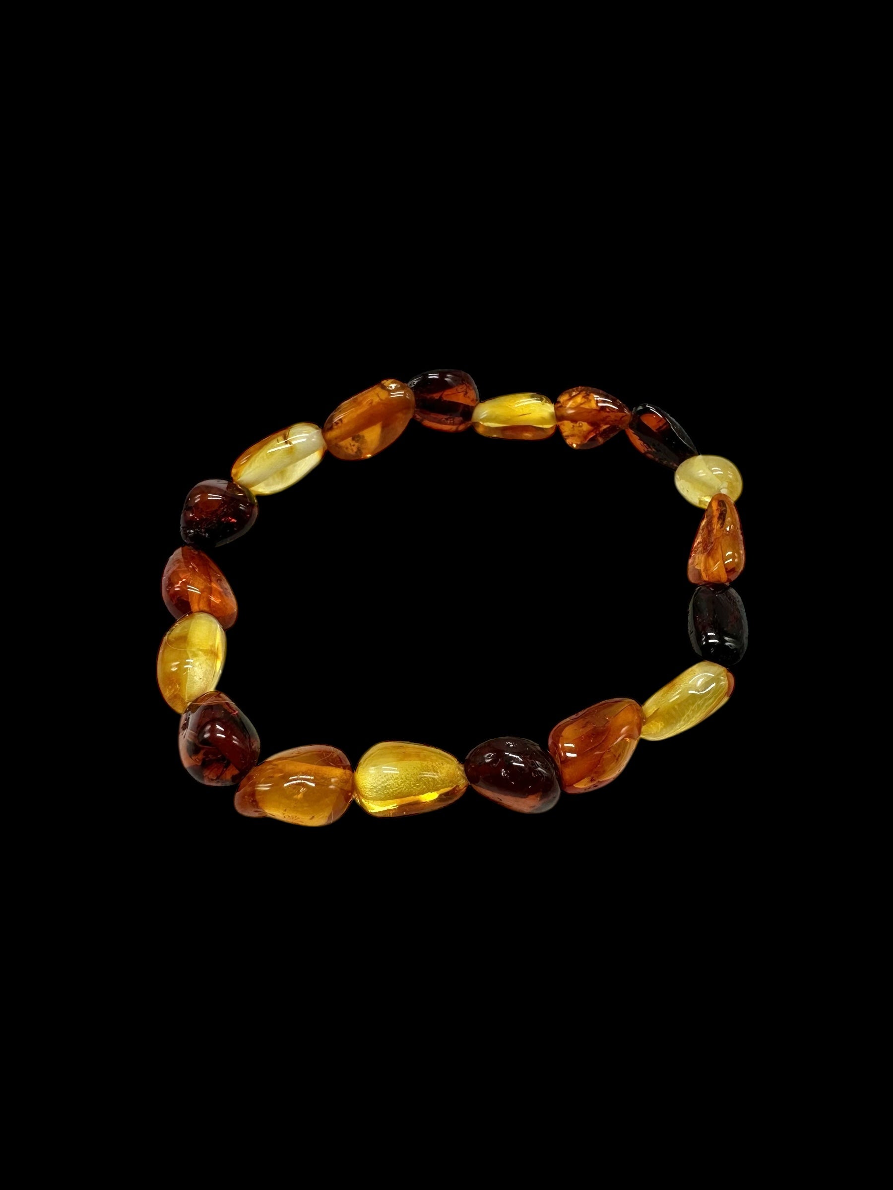 Children's bracelet made of polished genuine amber spheres / mix – random piece - N/J018
