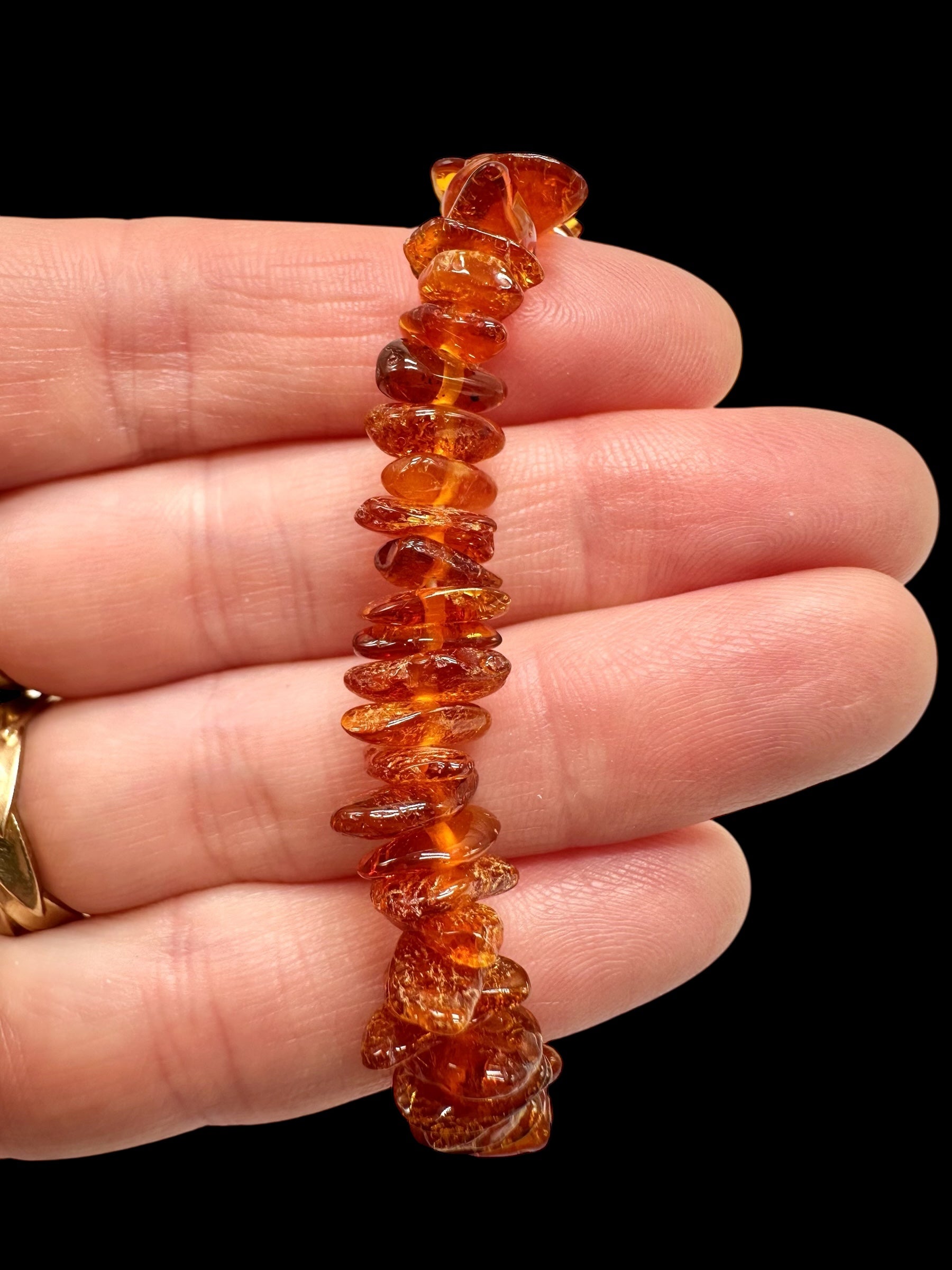Children's bracelet made of tumbled genuine amber / dark – random piece - N/J020
