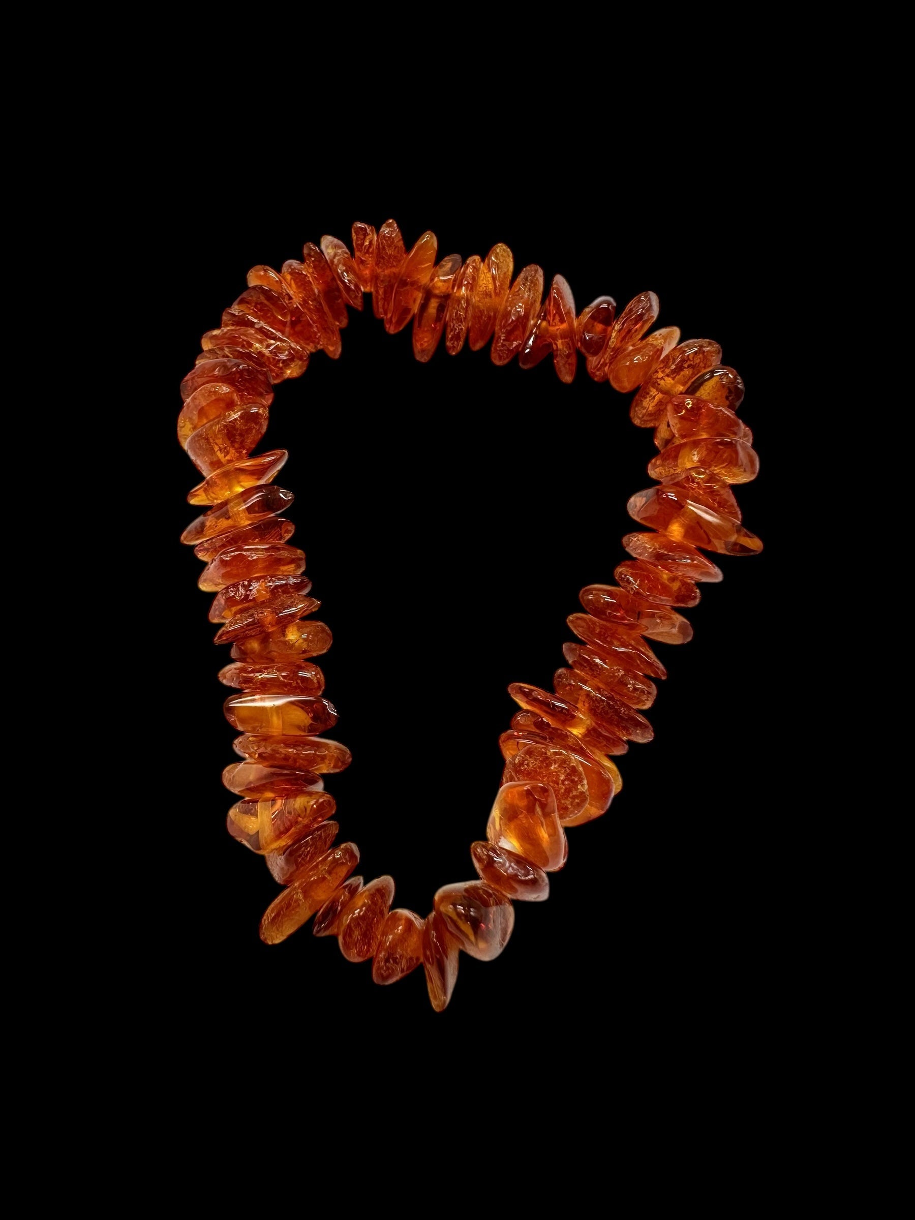 Children's bracelet made of tumbled genuine amber / dark – random piece - N/J020