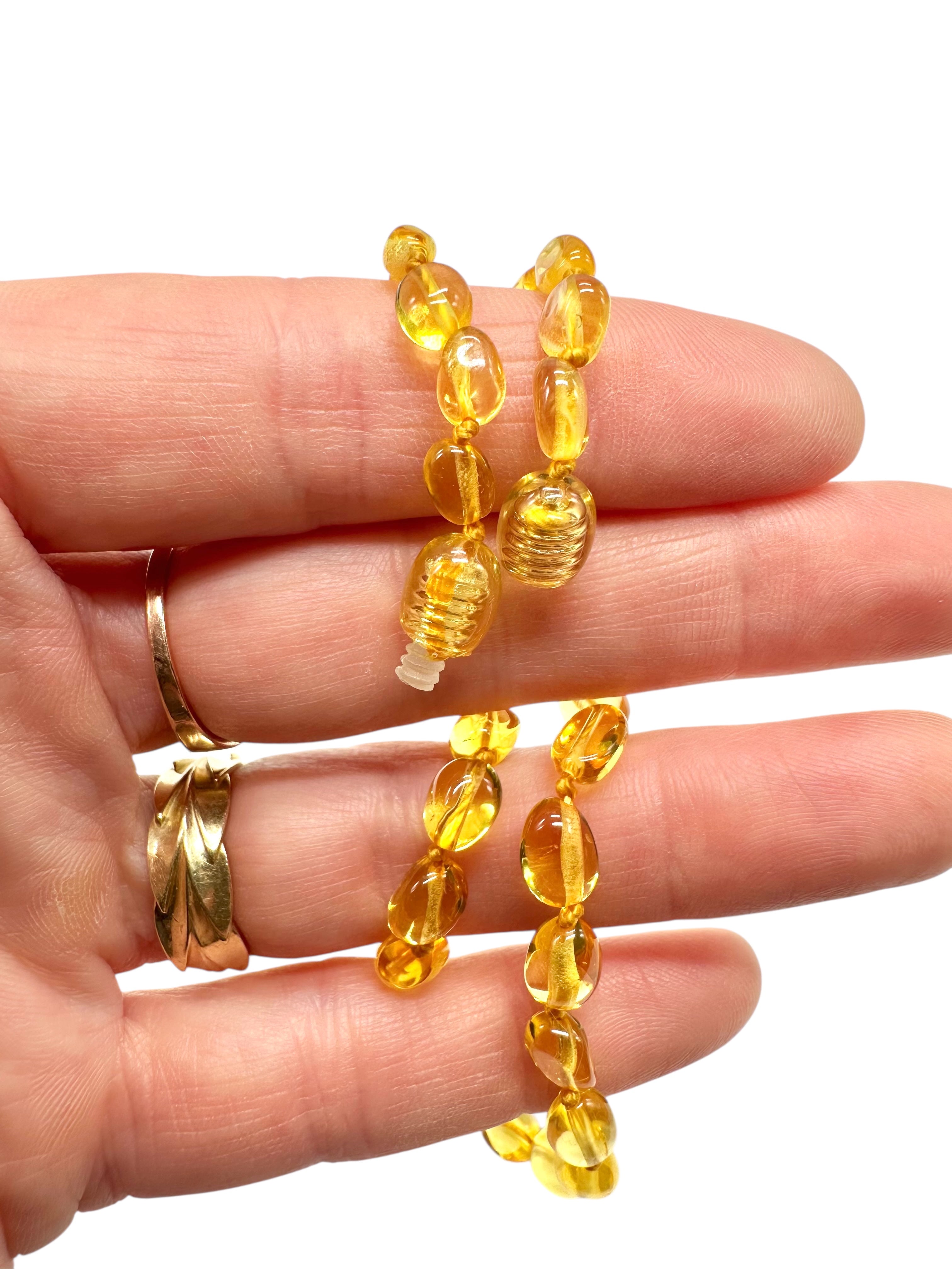 Children's necklace made of polished genuine amber spheres / light – random piece - NA/J001