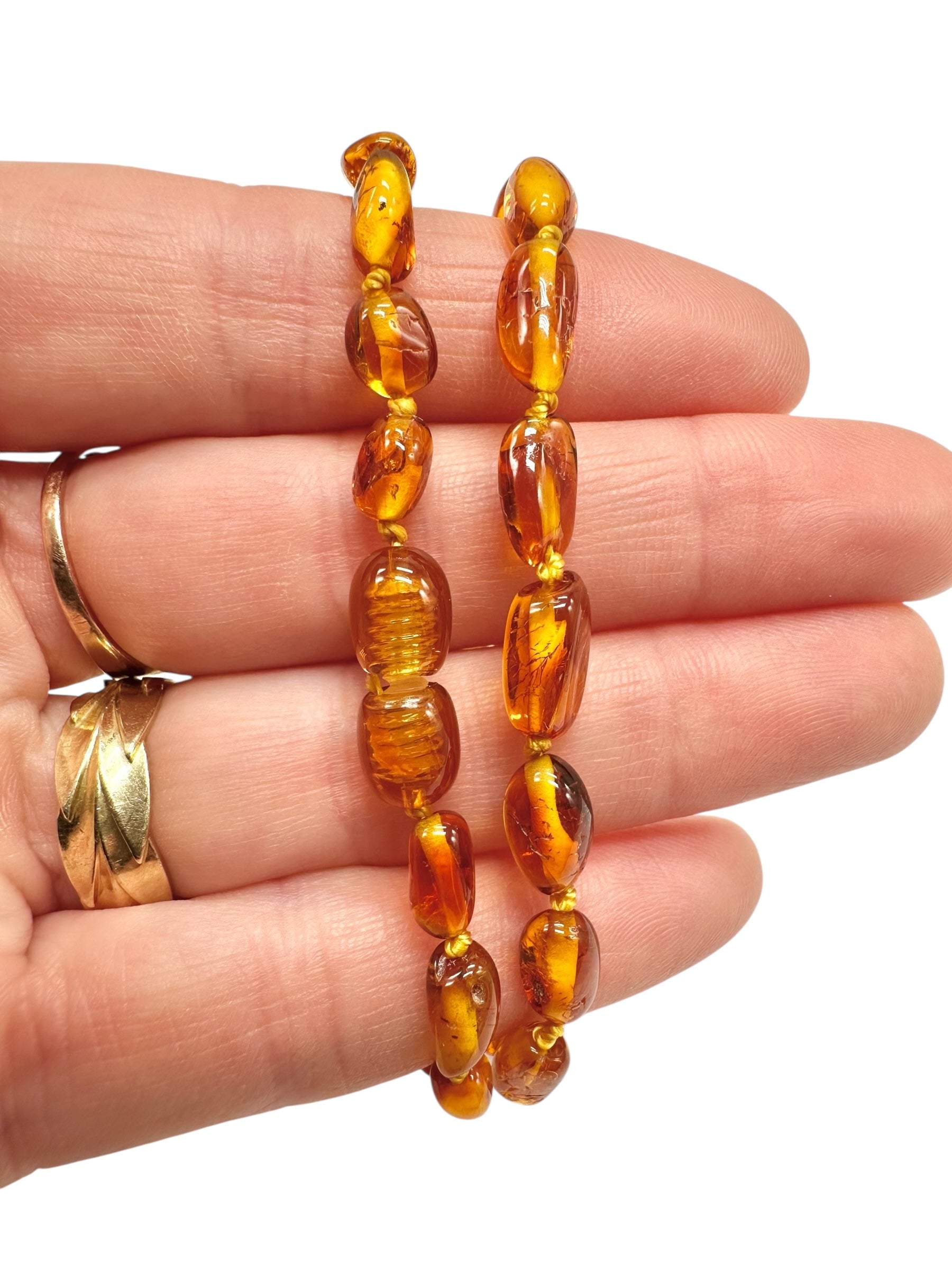 Children's necklace made of polished genuine amber spheres / dark – random piece - NA/J002