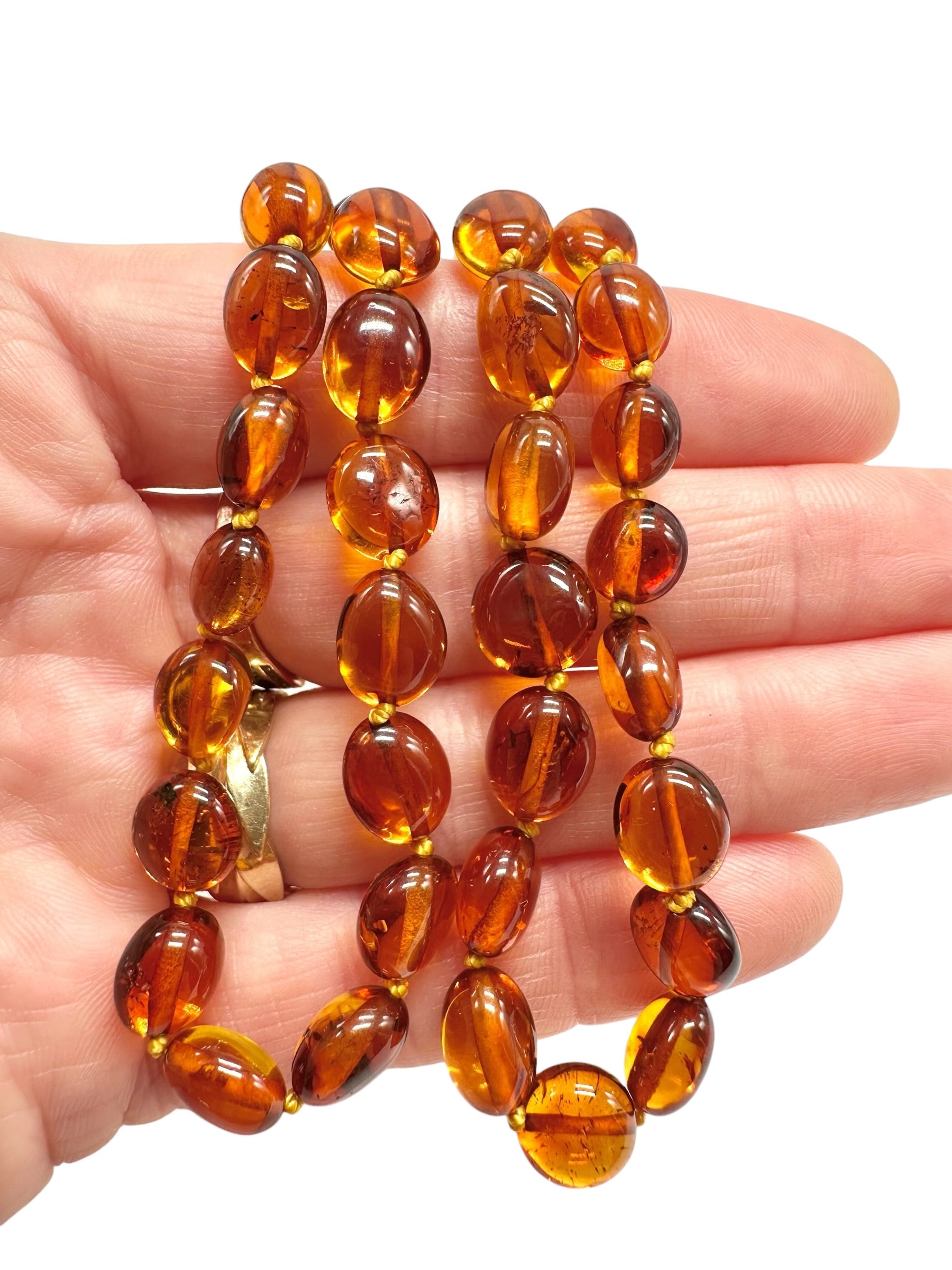 Necklace made of polished genuine amber spheres / dark – random piece - NA/J011