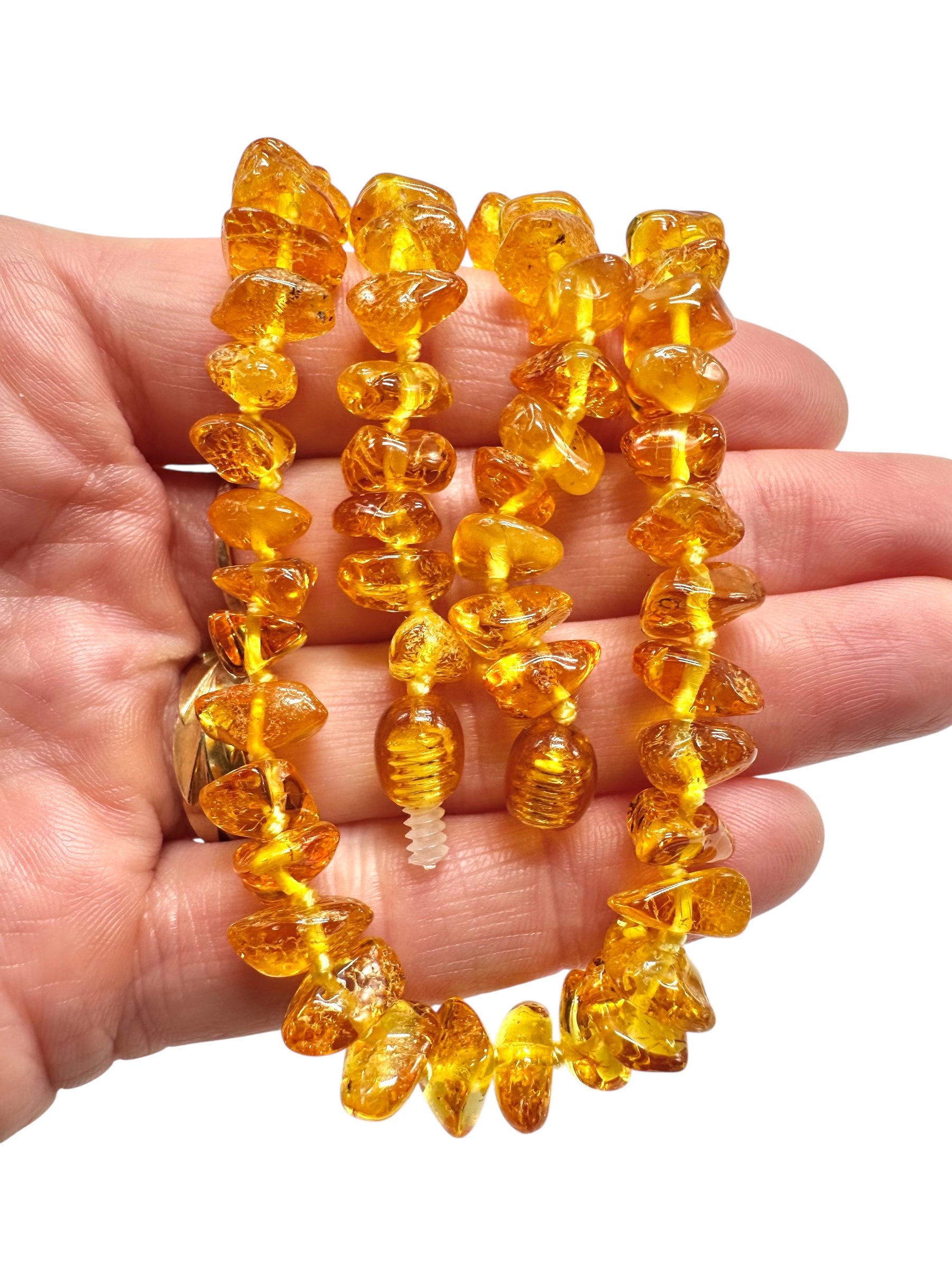 Necklace made of polished genuine amber spheres / light – random piece - NA/J013