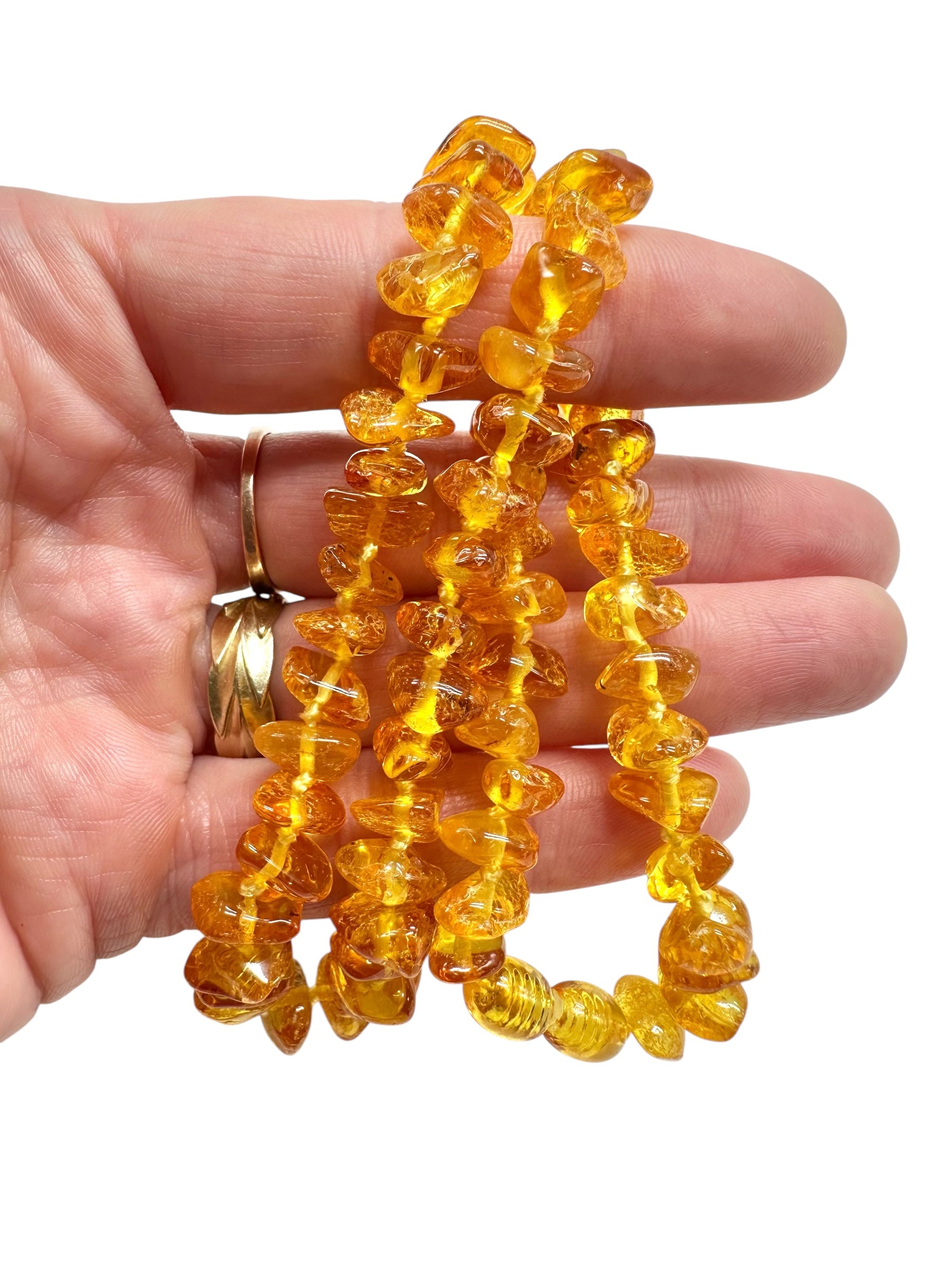 Necklace made of polished genuine amber spheres / light – random piece - NA/J013