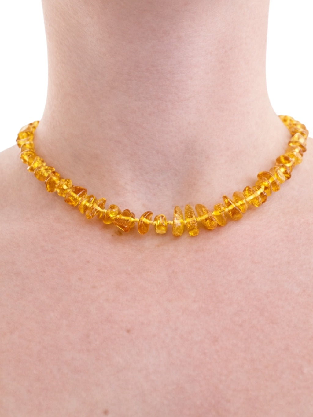 Necklace made of polished genuine amber spheres / light – random piece