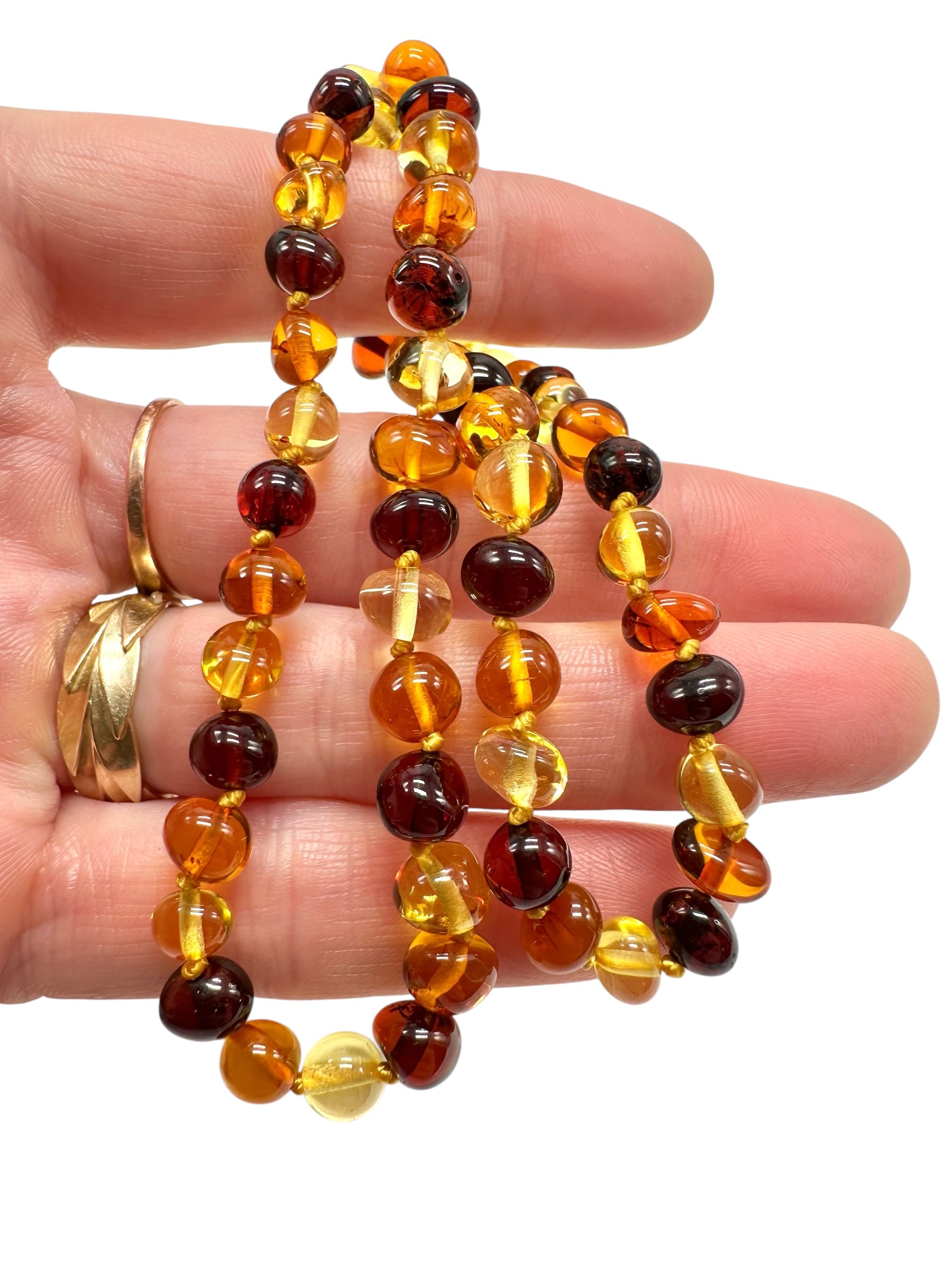 Necklace made of polished genuine amber spheres / mix – random piece - NA/J014