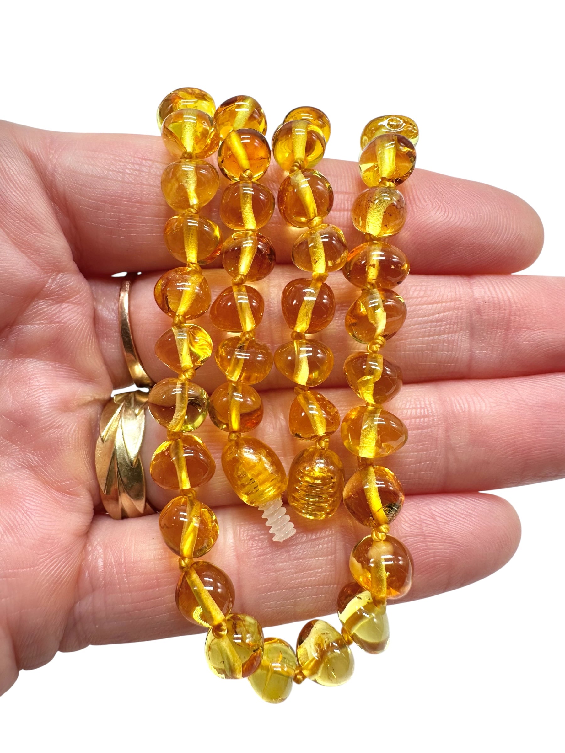Necklace made of polished genuine amber spheres / light – random piece - NA/J015