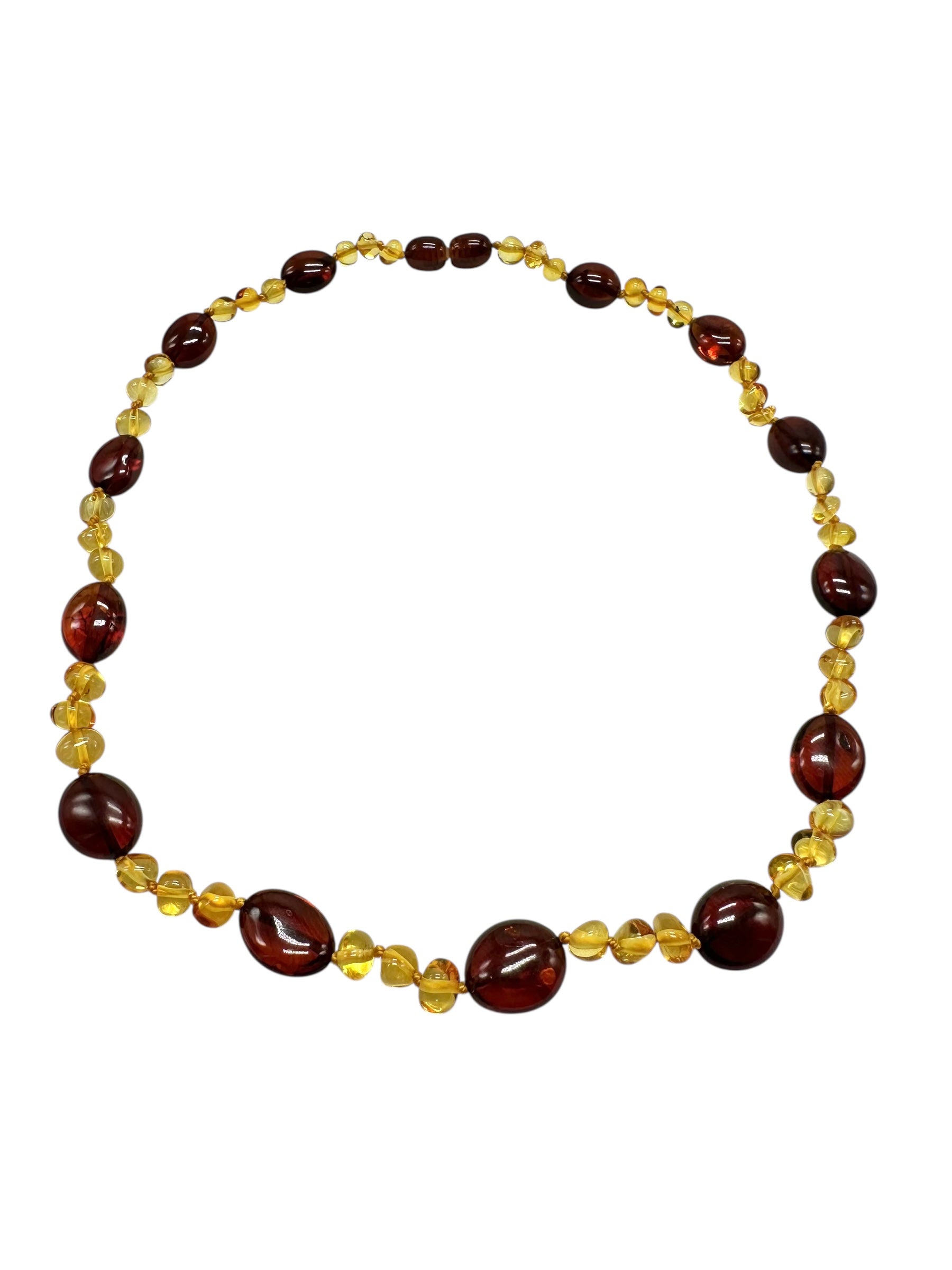 Necklace made of polished genuine amber spheres / mix – random piece