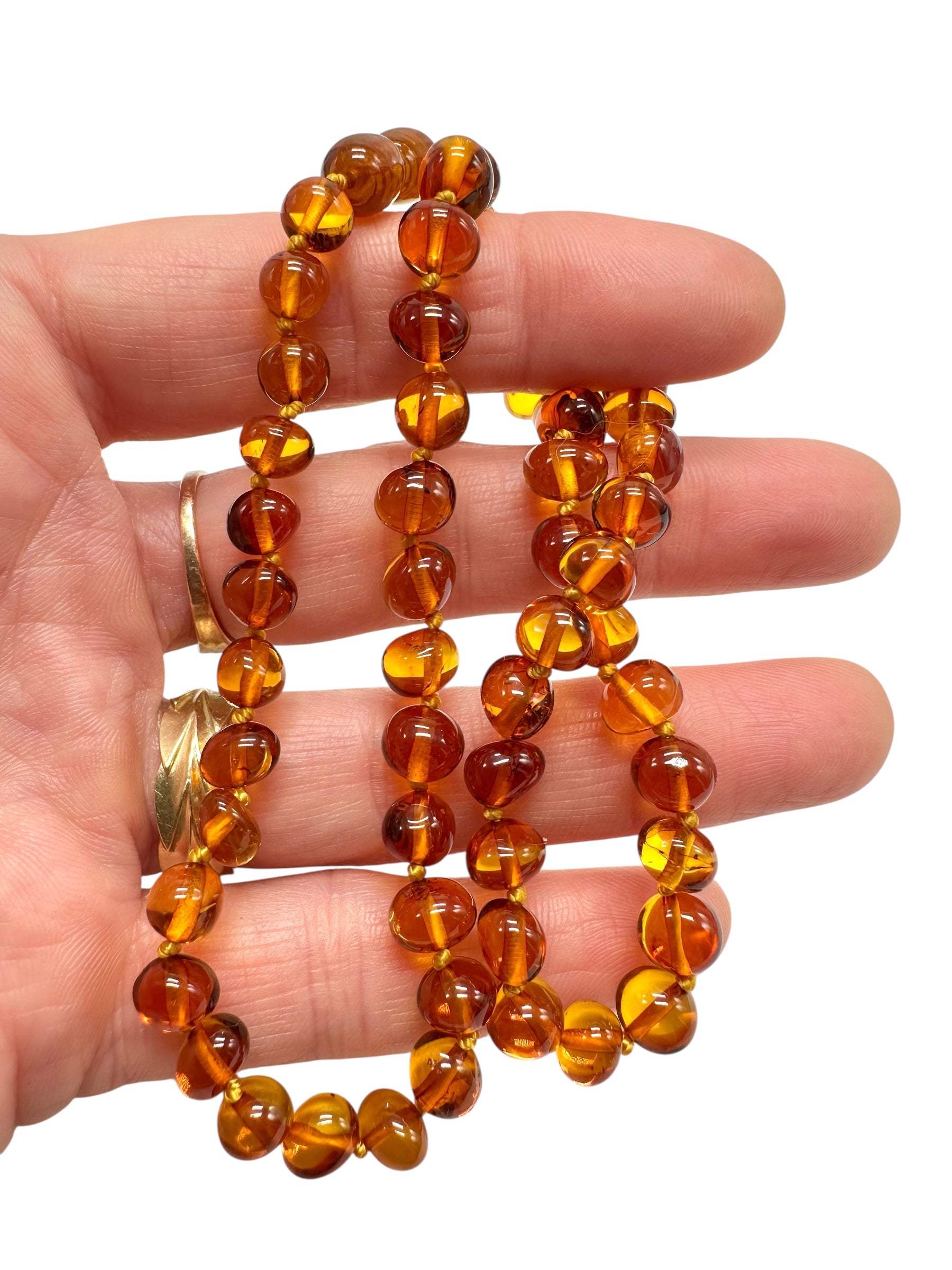 Necklace made of polished genuine amber spheres / dark – random piece - NA/J017