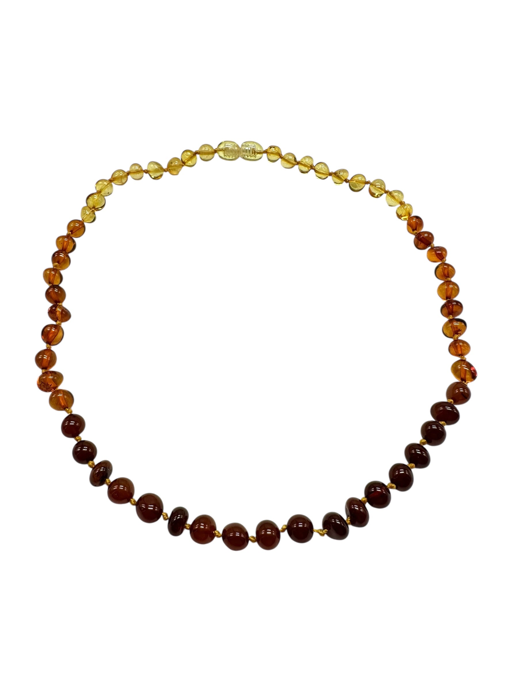 Necklace made of polished genuine amber spheres / mix – random piece