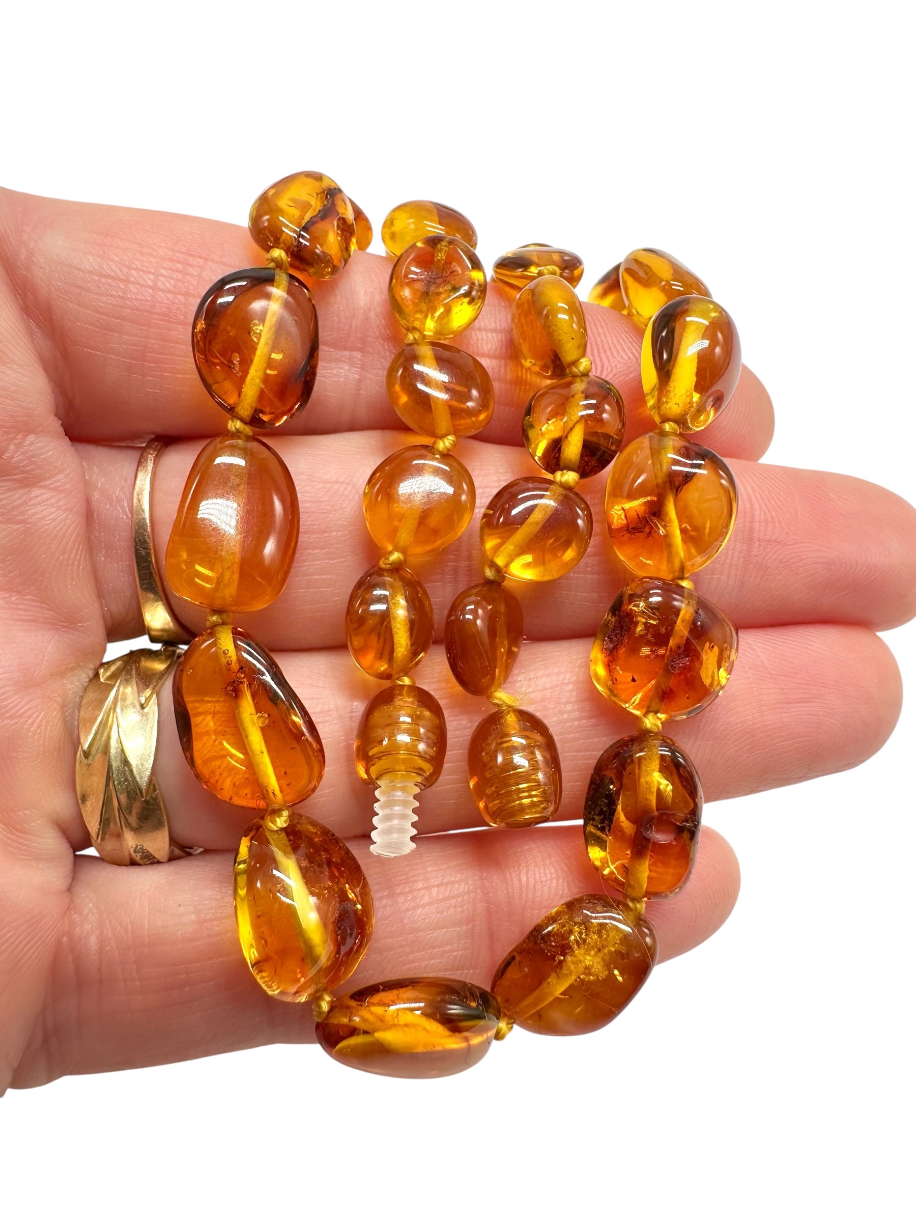 Necklace made of polished genuine amber spheres / dark – random piece - NA/J020