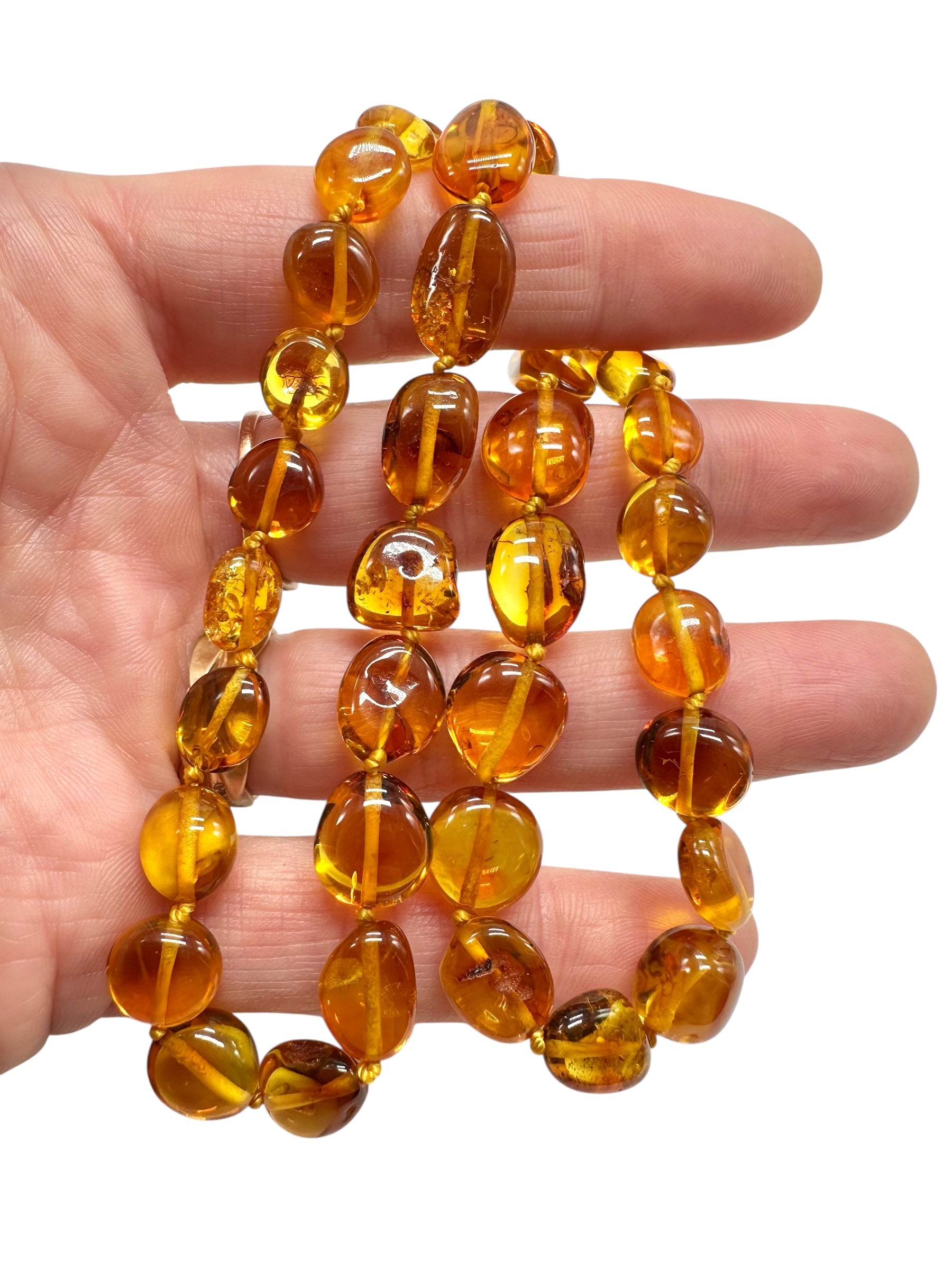Necklace made of polished genuine amber spheres / dark – random piece - NA/J020