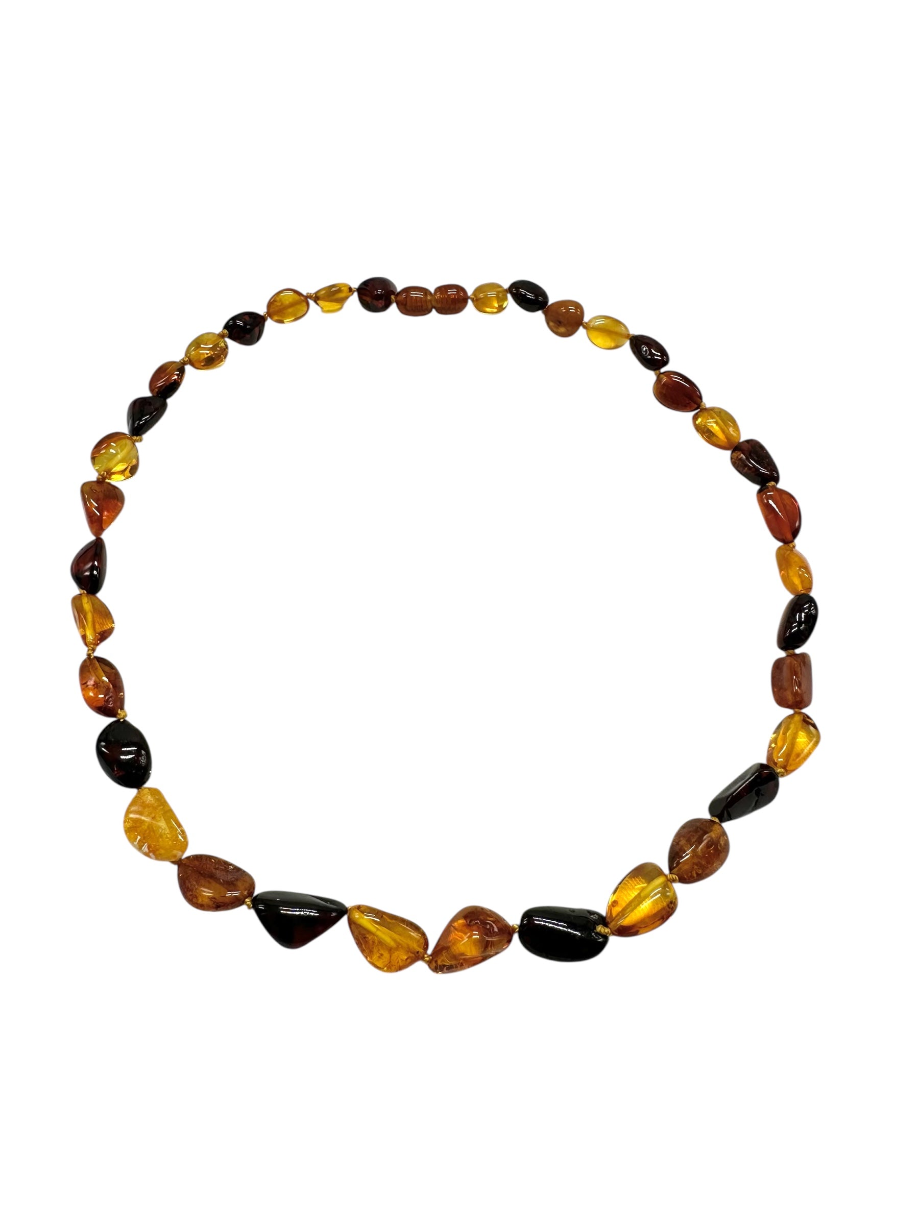 Necklace made of polished genuine amber spheres / mix – random piece