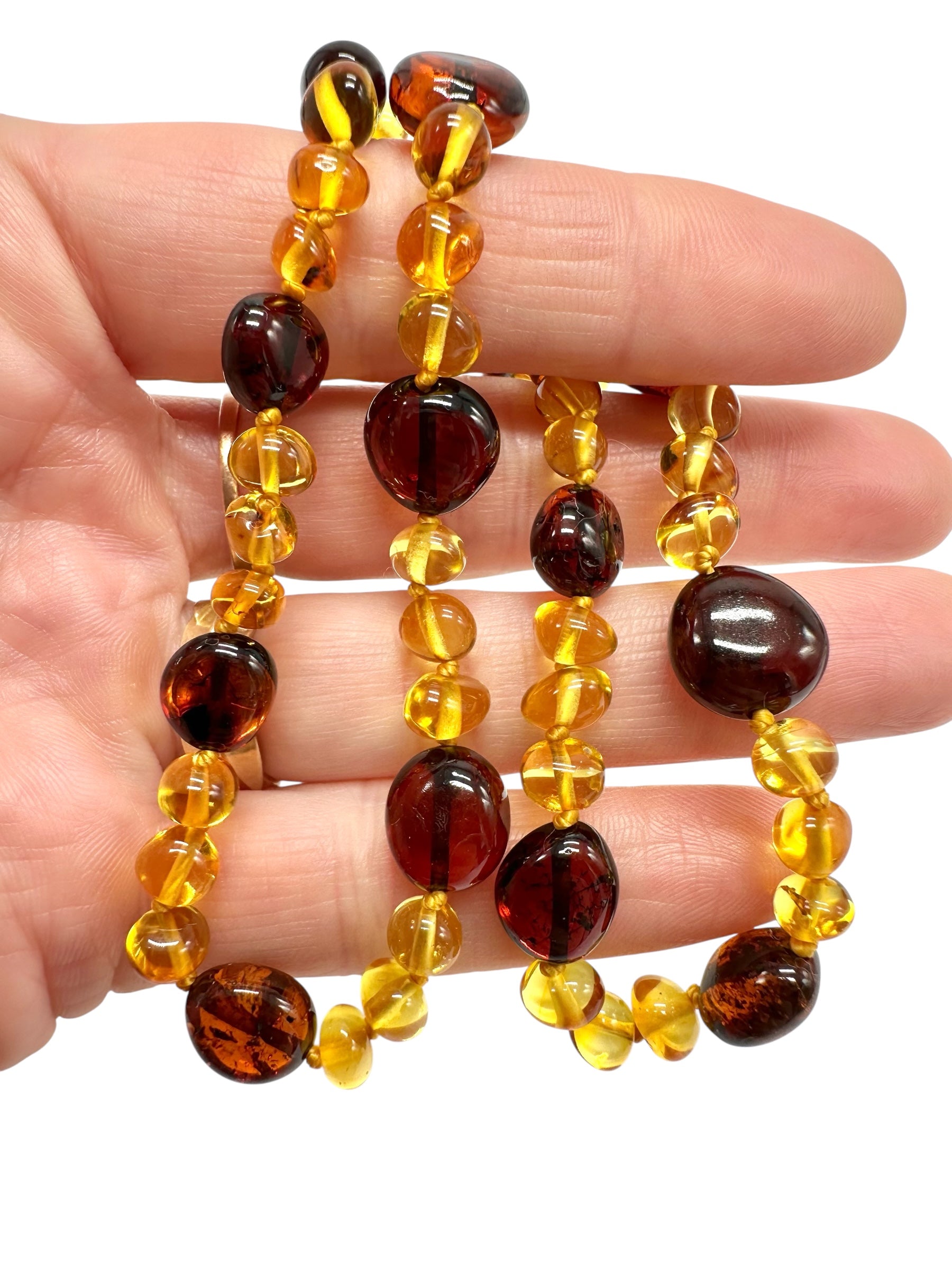 Necklace made of polished genuine amber spheres with insects / mix - NA/J023