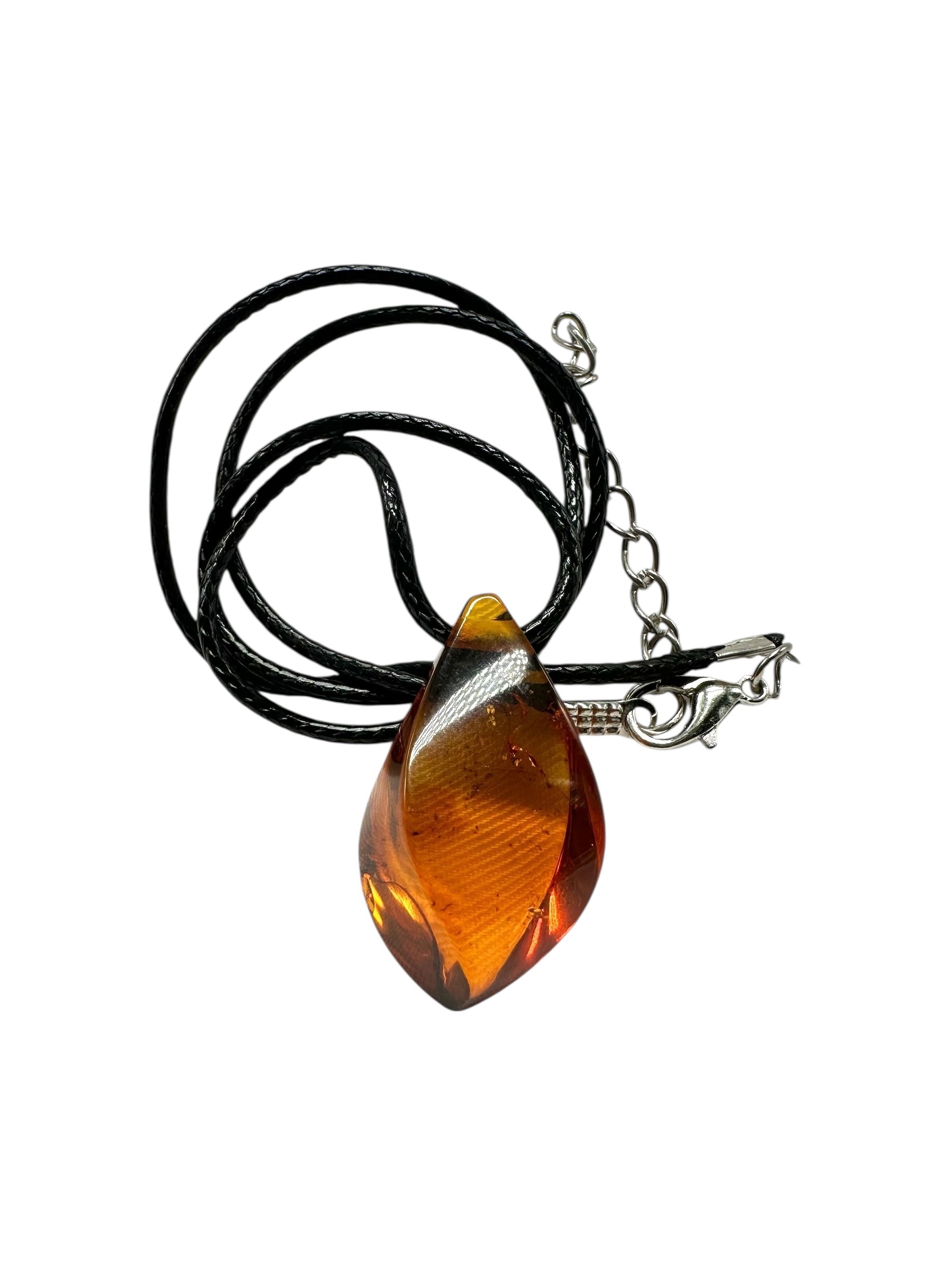 Amber pendant with leather cord