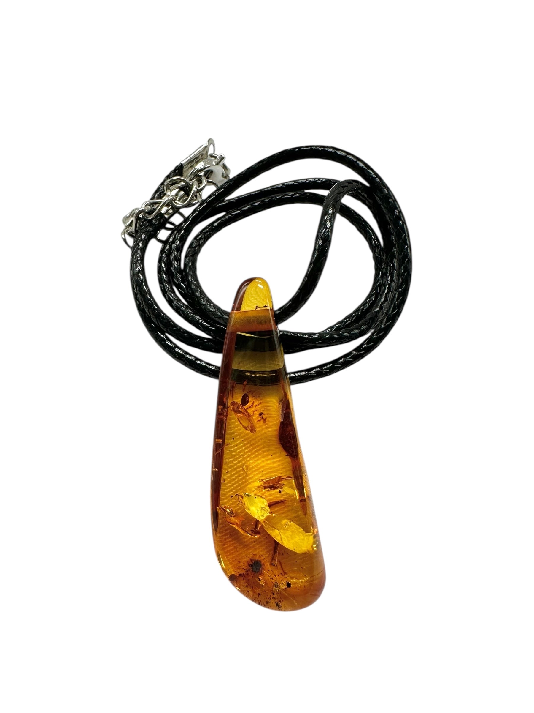 Amber pendant with leather cord