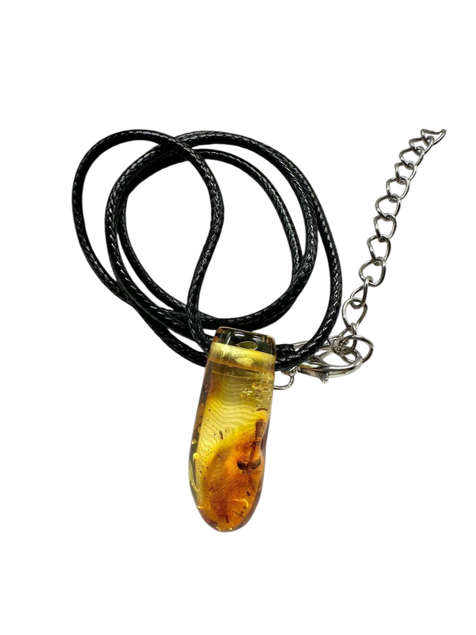 Amber pendant with leather cord
