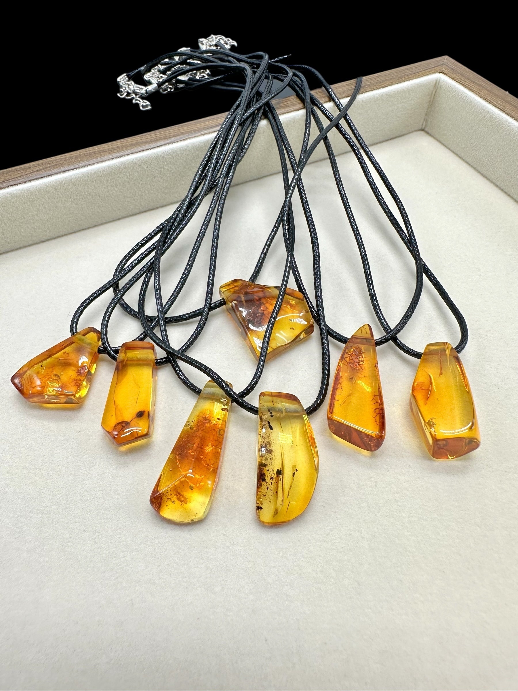 Amber pendant with leather cord – random piece